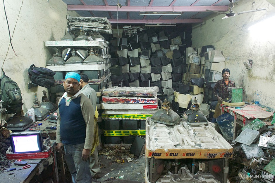 In Mustafabad, Delhi, e-waste work is unregulated labor in windowless basement with practically no ventilation.