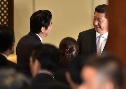 President Xi Jinping and Prime Minister Shinzo Abe