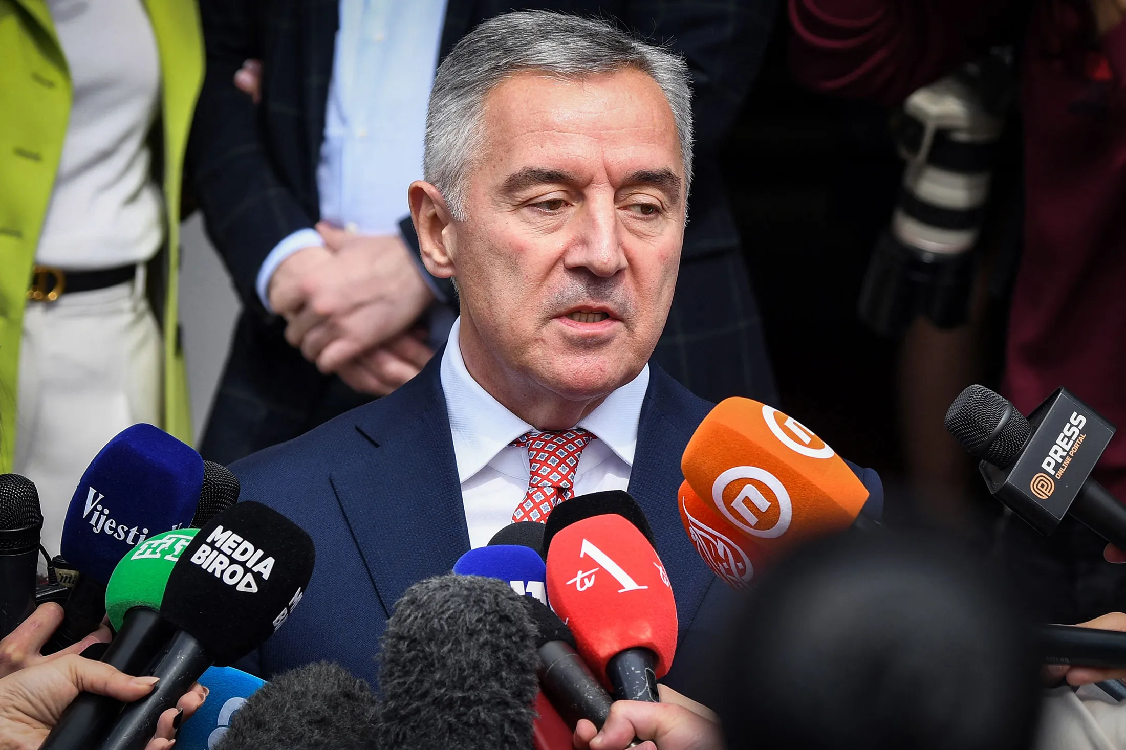 Milo Djukanovic speaks to media after voting for the presidential election at a polling station in Podgorica, on March 19.