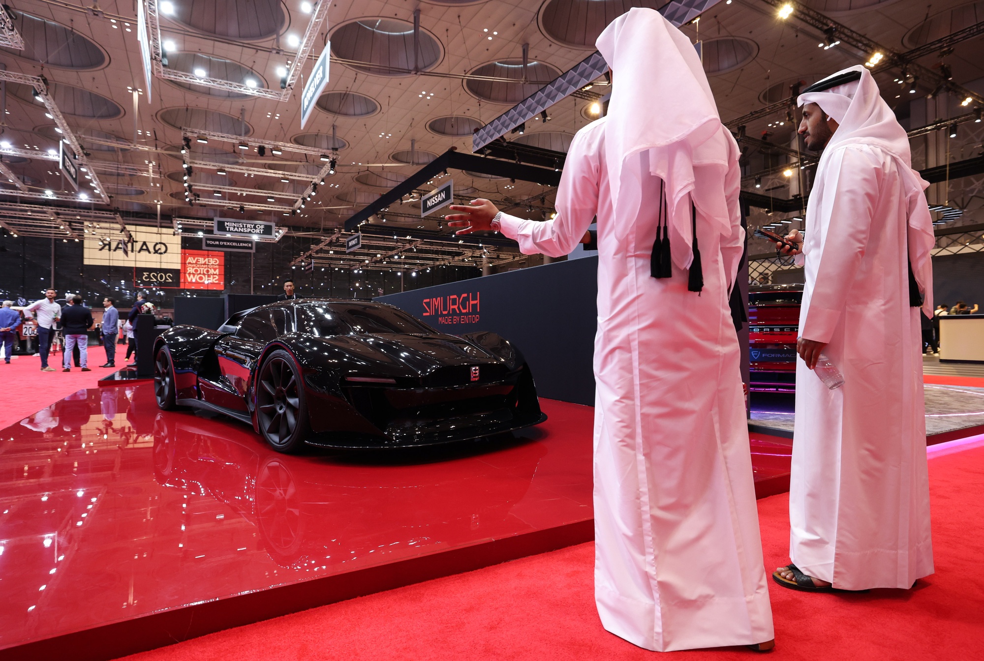 Attendees view the Entop Simurgh supercar&nbsp;at the Geneva International Motor Show Qatar 2023.