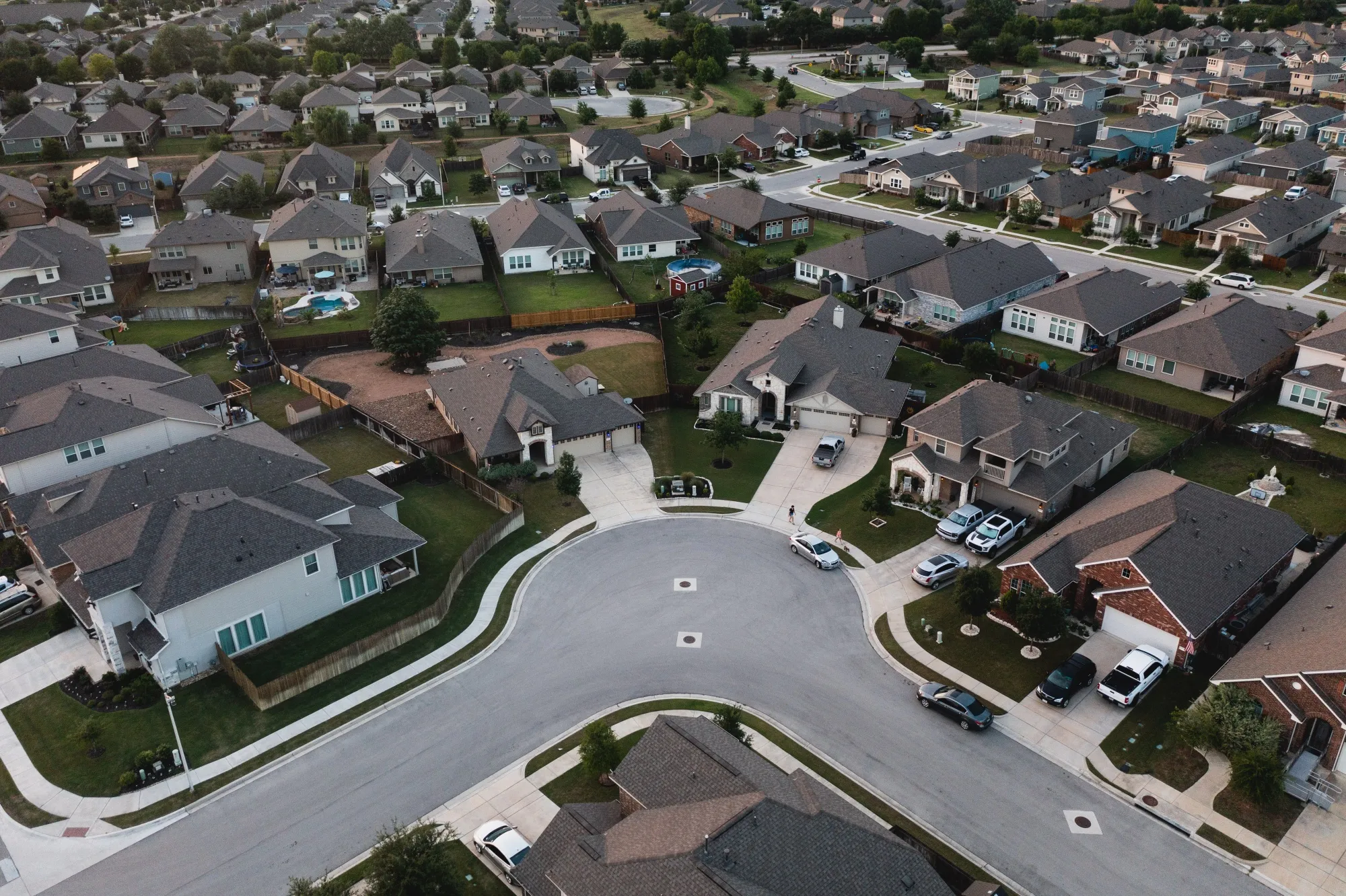 The organization guarantees bonds backed by mortgages made under government programs to consumers who might not be able to otherwise afford to buy a home.