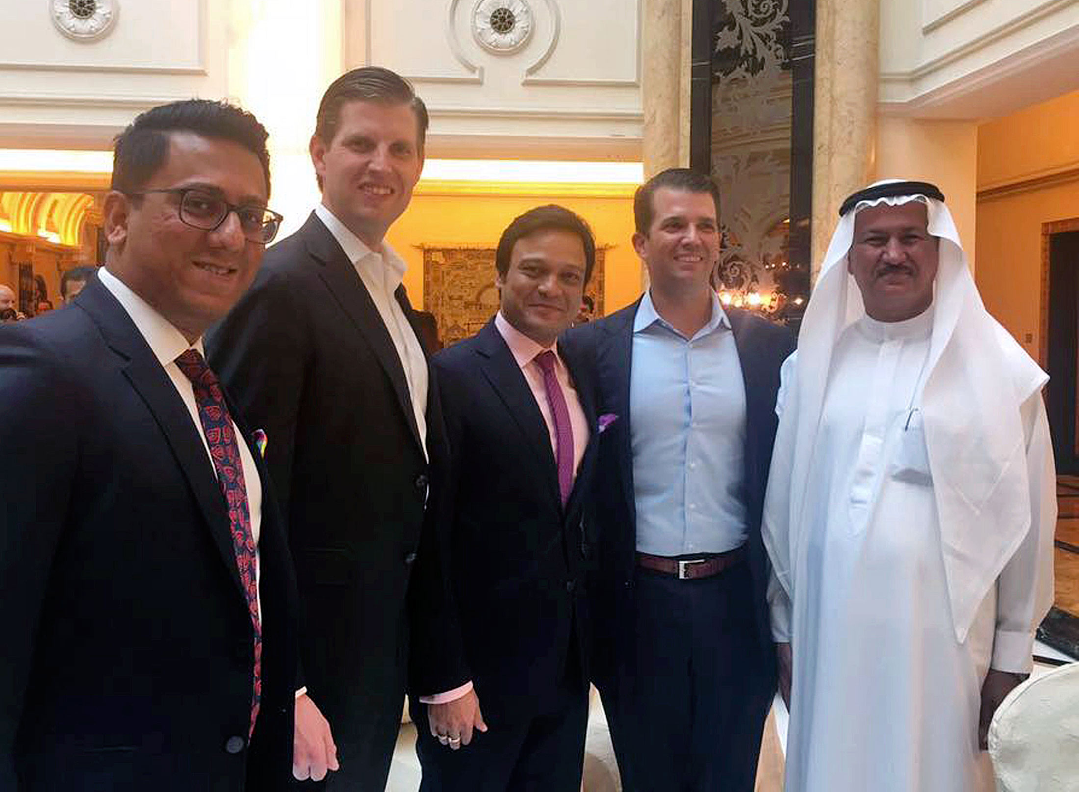 Banke International director Niraj Masand, far left, poses for a photo with Eric Trump, second left, Banke International director Porush Jhunjhunwala, center, Donald Trump Jr., second right, and DAMAC Properties chairman Hussain Sajwani, during festivities marking the formal opening of the Trump International Golf Club, in Dubai, United Arab Emirates on Feb. 18.
