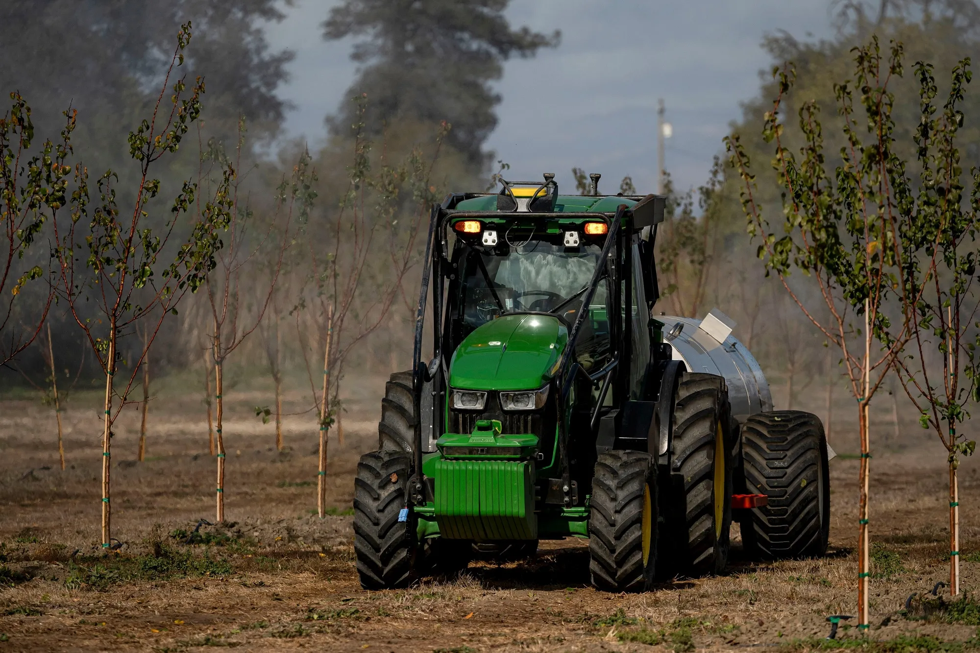 A John Deere autonomous orchard tractor during a November preview event.
