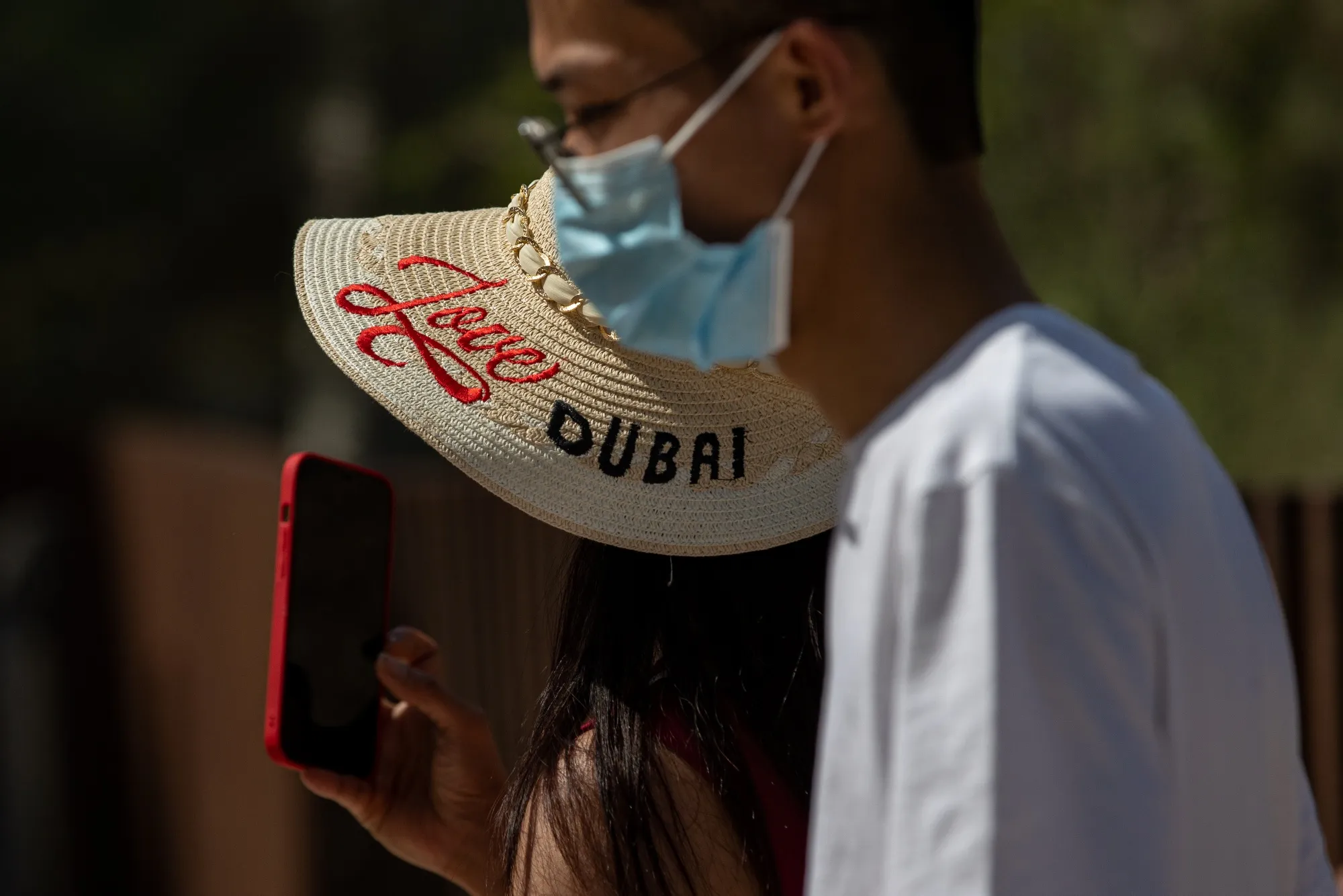 A visitor wears a 'Love Dubai' hat at Expo 2020 in Dubai, United Arab Emirates.