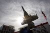 A model of a Raytheon Co. fighter jet is seen on display on the second day of the Farnborough International Airshow in Farnborough, U.K., on Tuesday, July 20, 2010. The Farnborough International Airshow is being held from July 19-25.