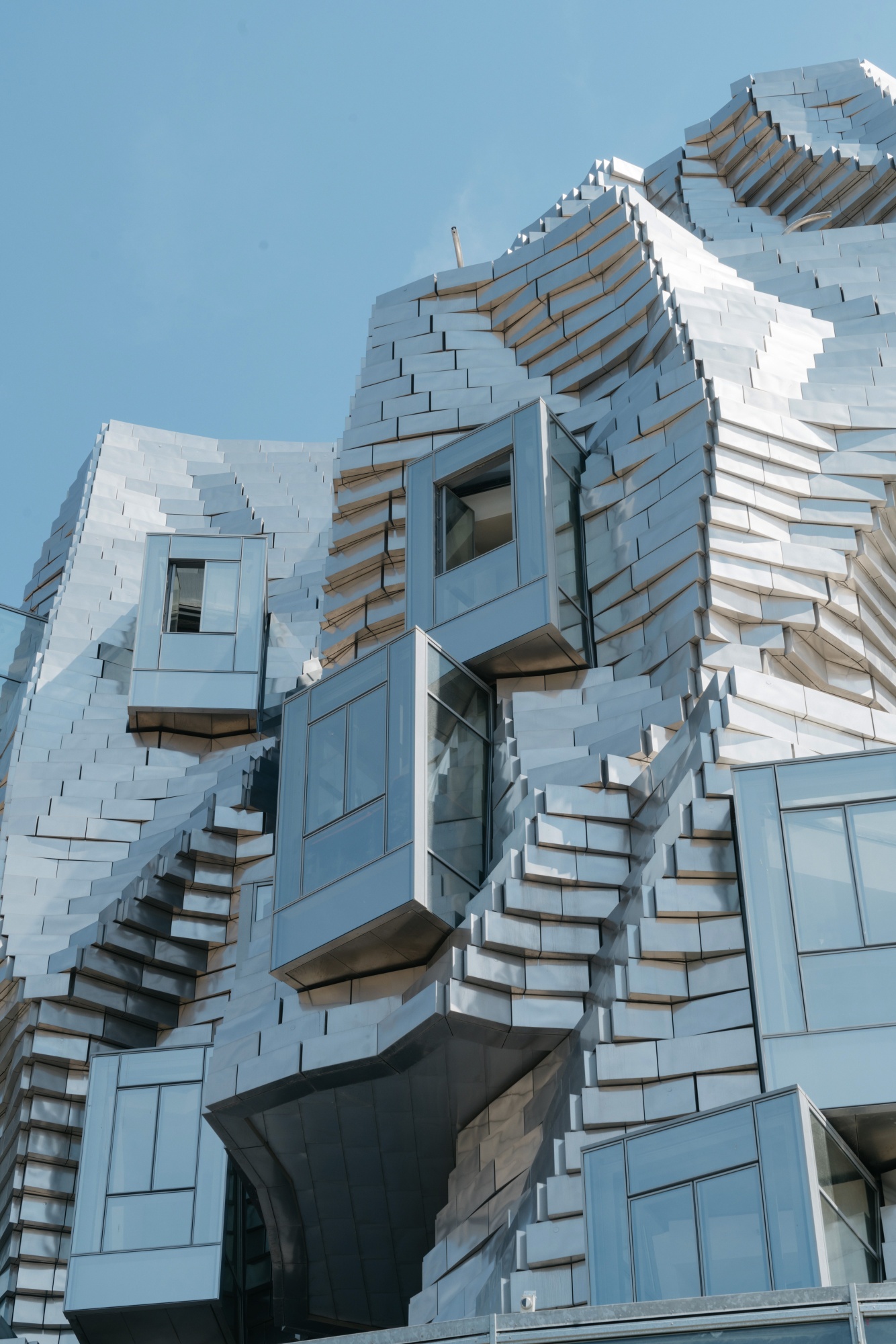 Frank Gehry unveils stainless steel-clad tower for Luma Arles arts centre