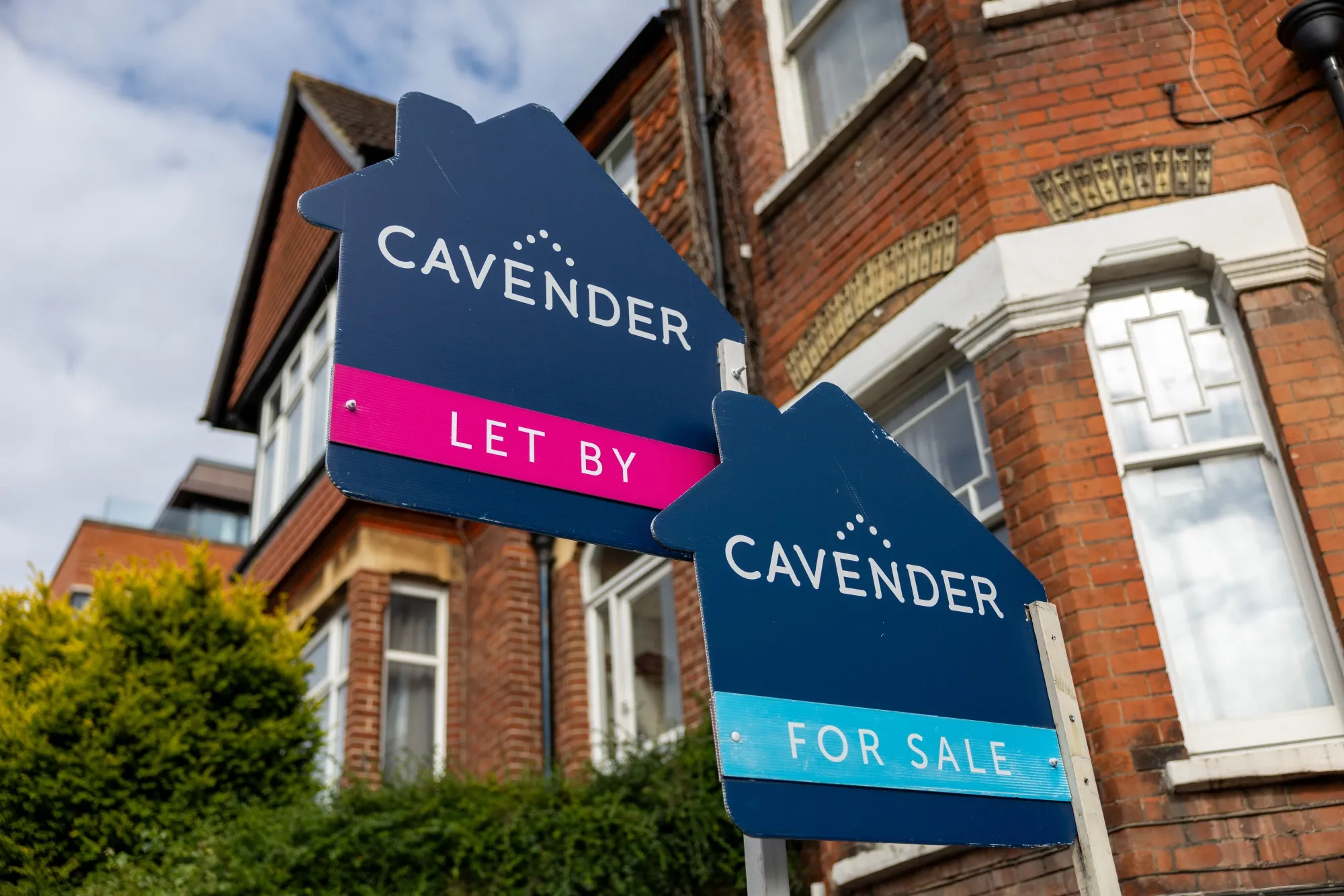 Estate agent&nbsp;signs outside residential properties in Guildford, UK