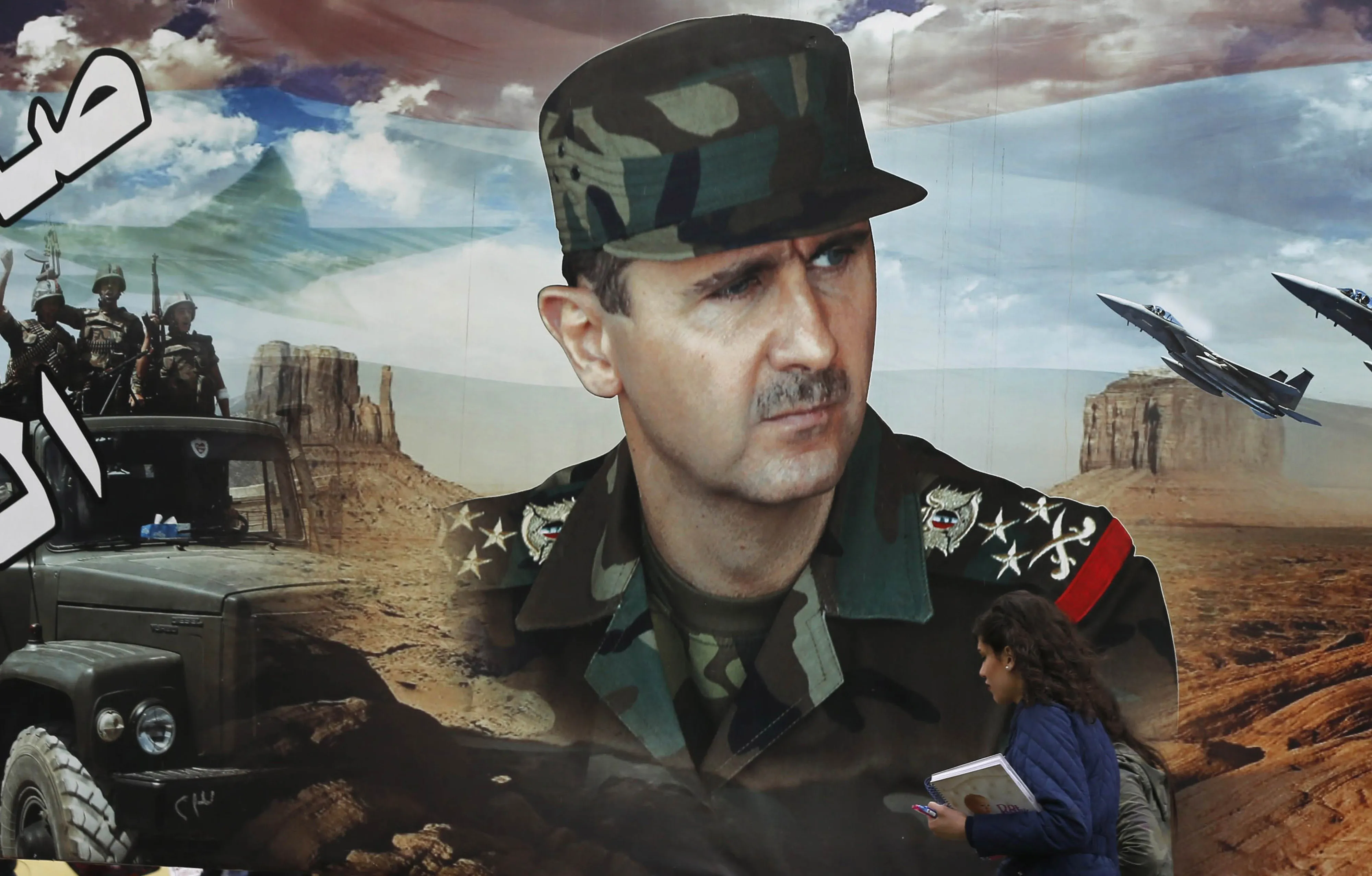 A portrait of Syrian president Bashar al-Assad in the old city of Damascus.