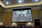 A video of former US President Donald Trump is played on a screen during a hearing of the Select Committee to Investigate the January 6th Attack on the US Capitol in Washington, DC, US, on Oct. 13.