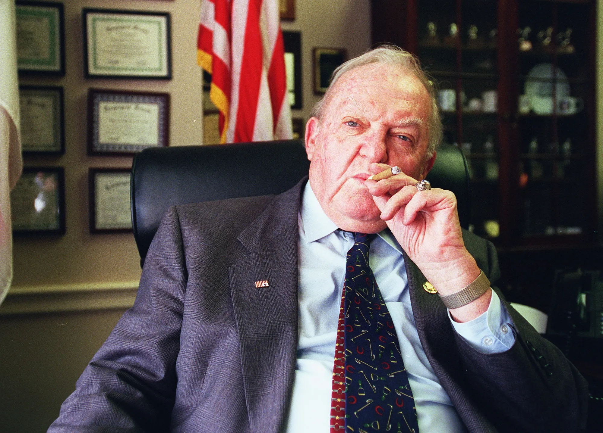 Congressmen Howard Coble smokes in his office in Washington DC in 1997.