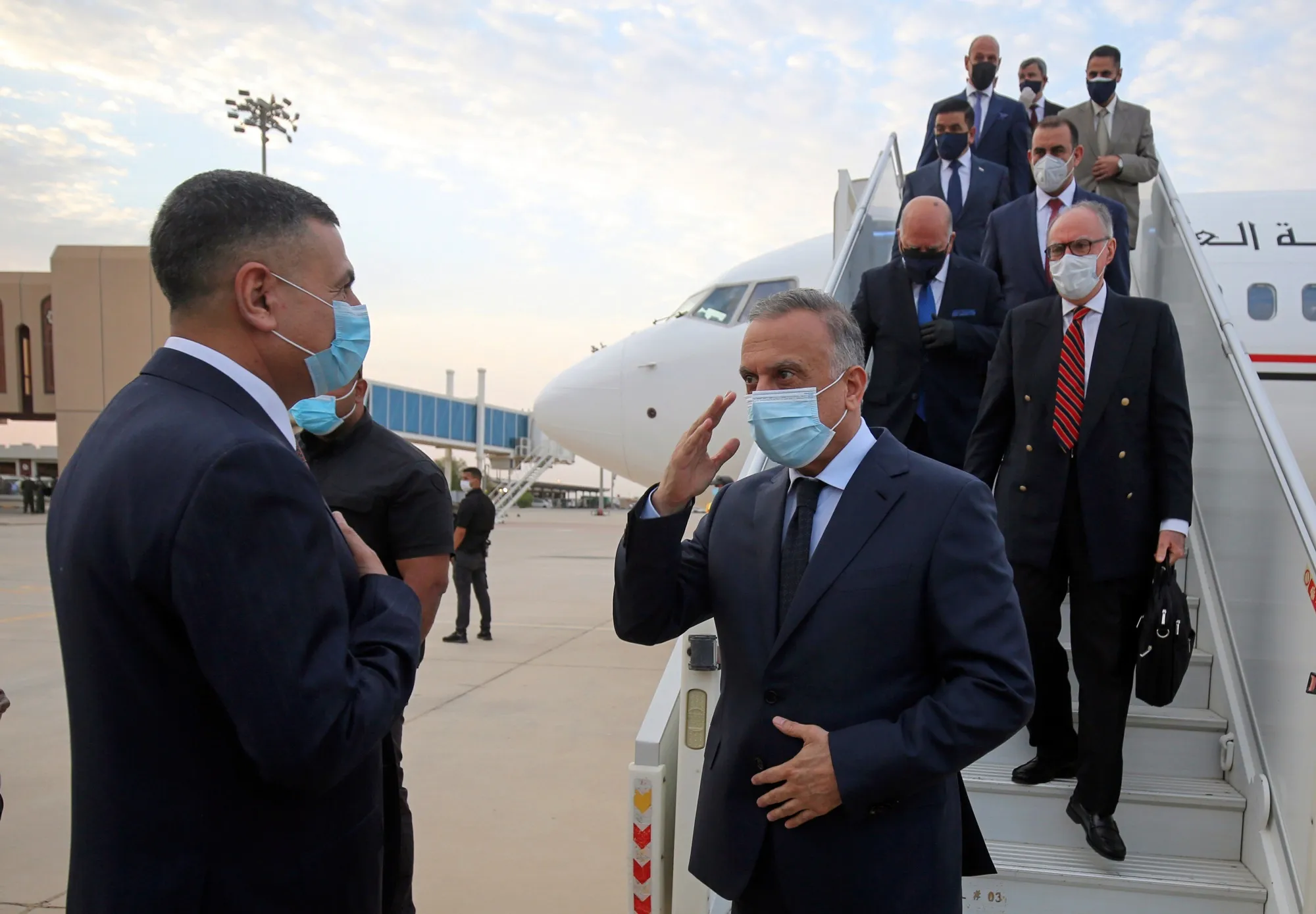 Mustafa al-Kadhimi, center, arrives in Basra, Iraq, on July 15, 2020.&nbsp;