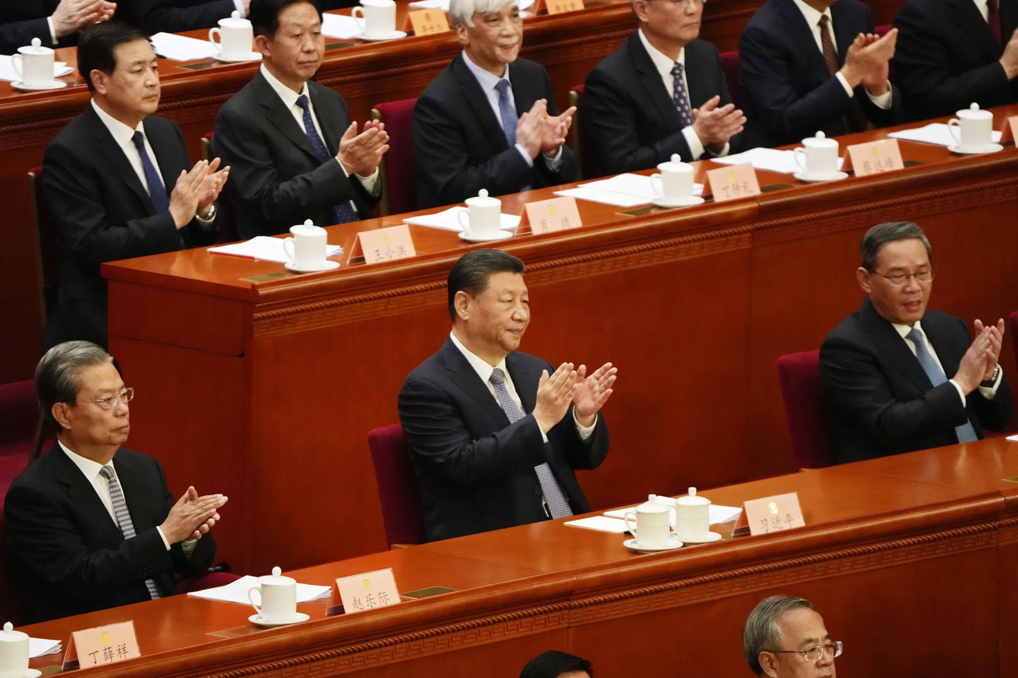 Chinese President Xi Jinping, center, attends the 14th Chinese People’s Political Consultative Conference in Beijing on Monday, March 4, 2024.