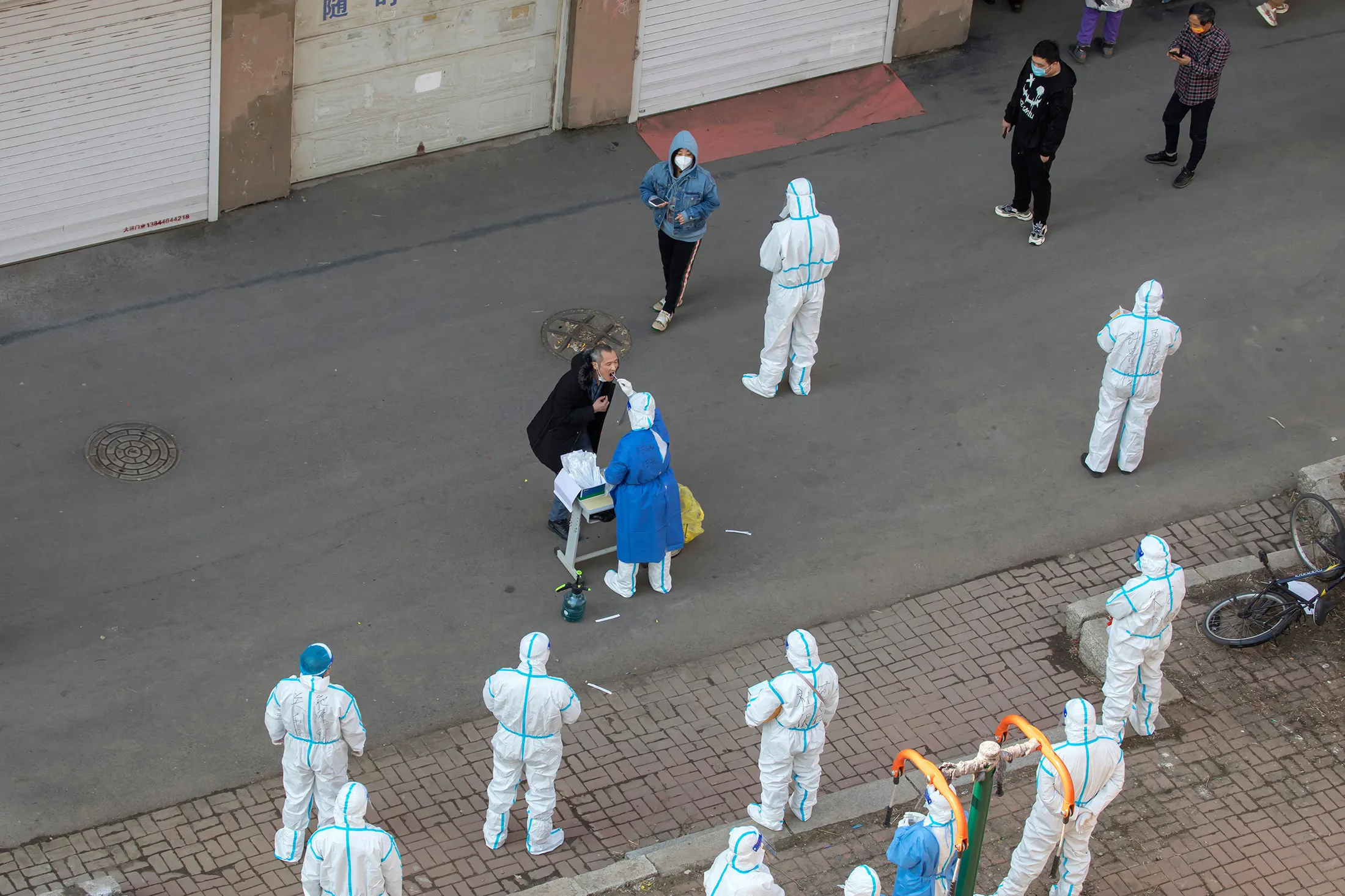 A worker in collects swab sample from a resident in Jilin&nbsp;earlier in April.