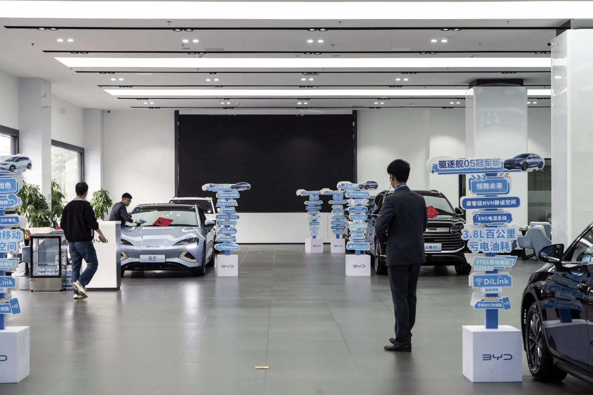Employees at a BYD Co. showroom in Shenzhen, China.