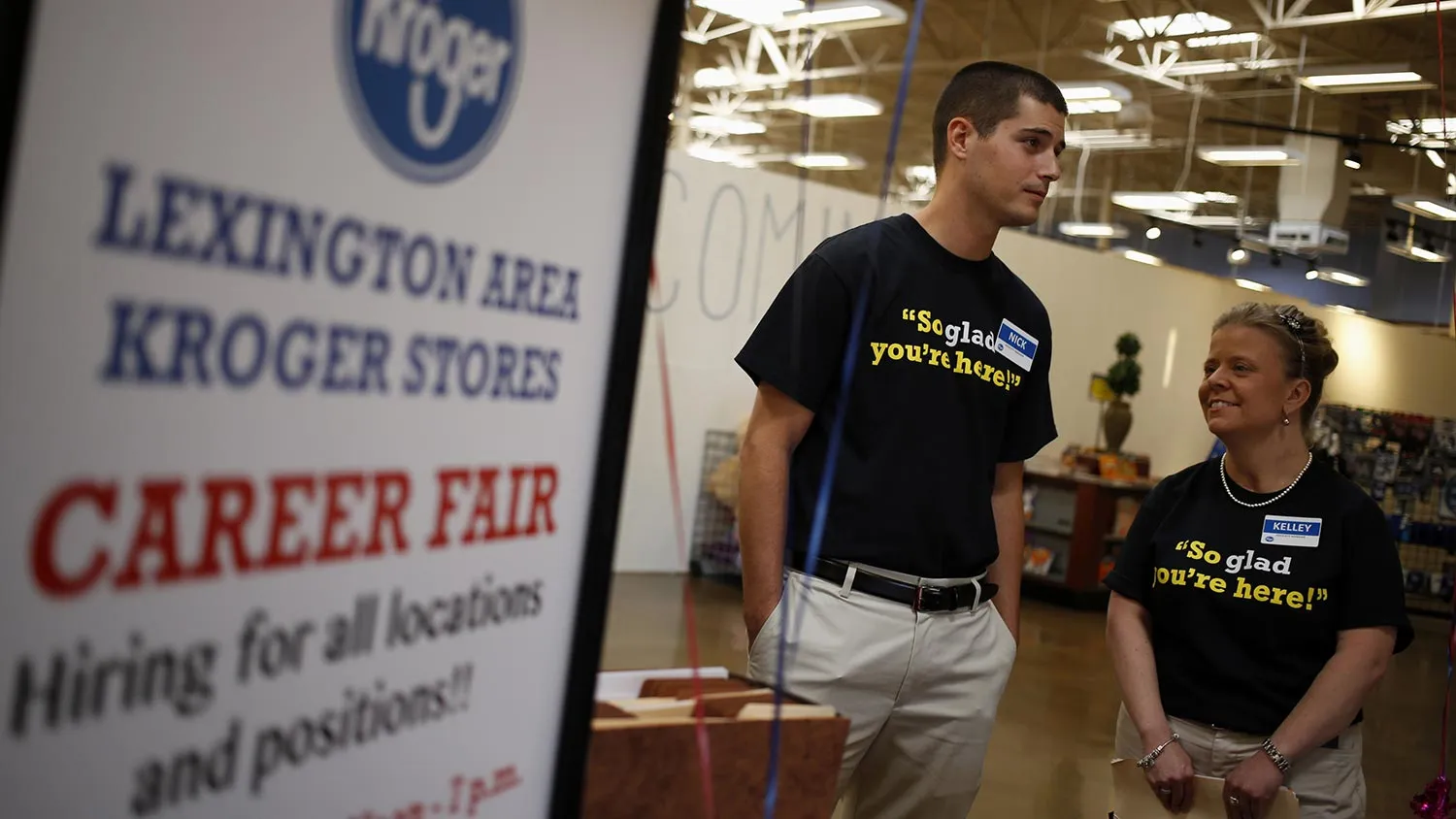 Employees wait to greet job seekers during a Kroger Co. Hiring Fair at one of the company's grocery stores in Lexington, Kentucky, U.S., on Wednesday, Oct. 8, 2014.
