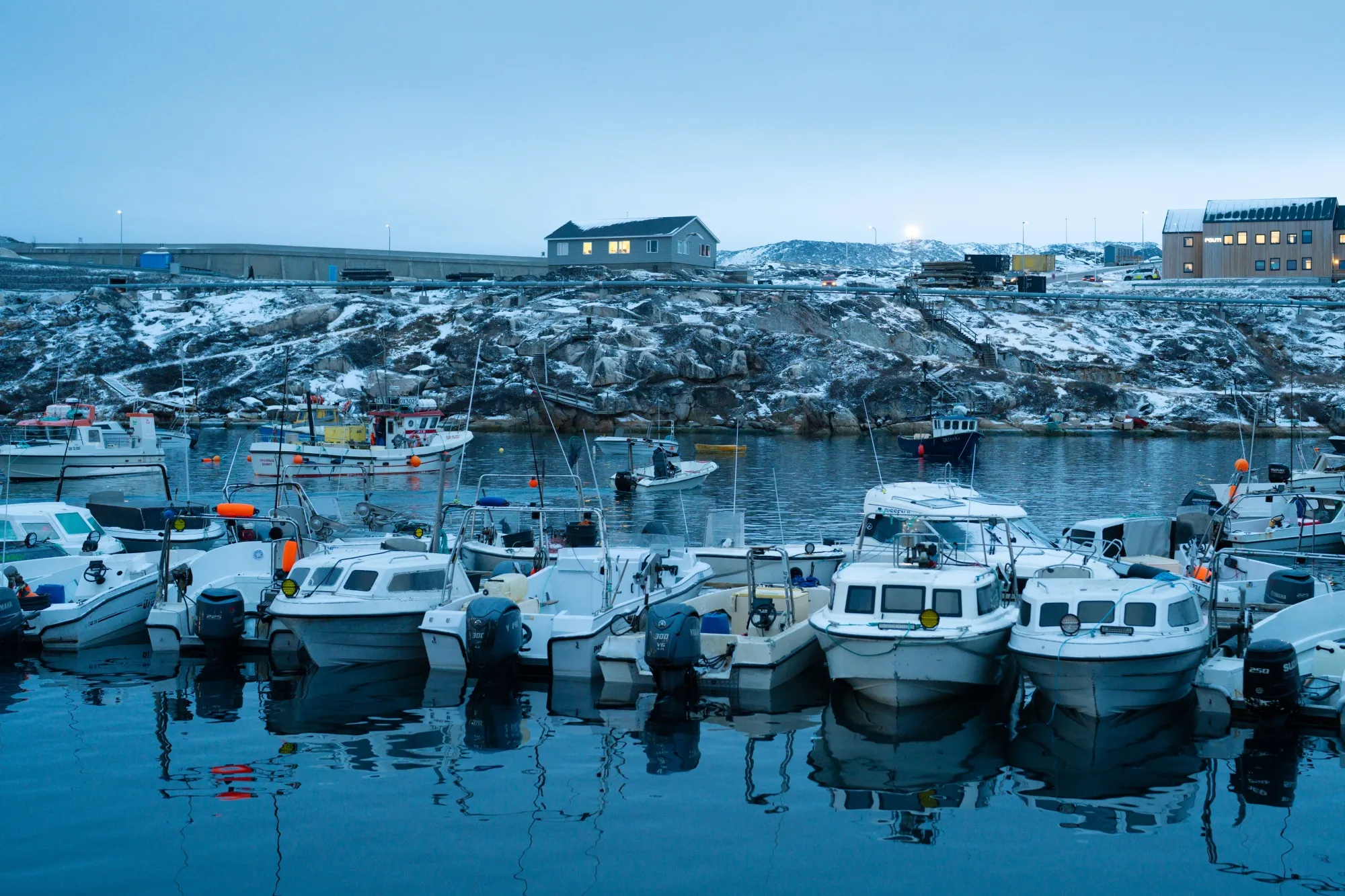 Fishing boats in the harbor at Ilulissat, Greenland.