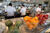 Staff prepare food at a restaurant in Dubai.