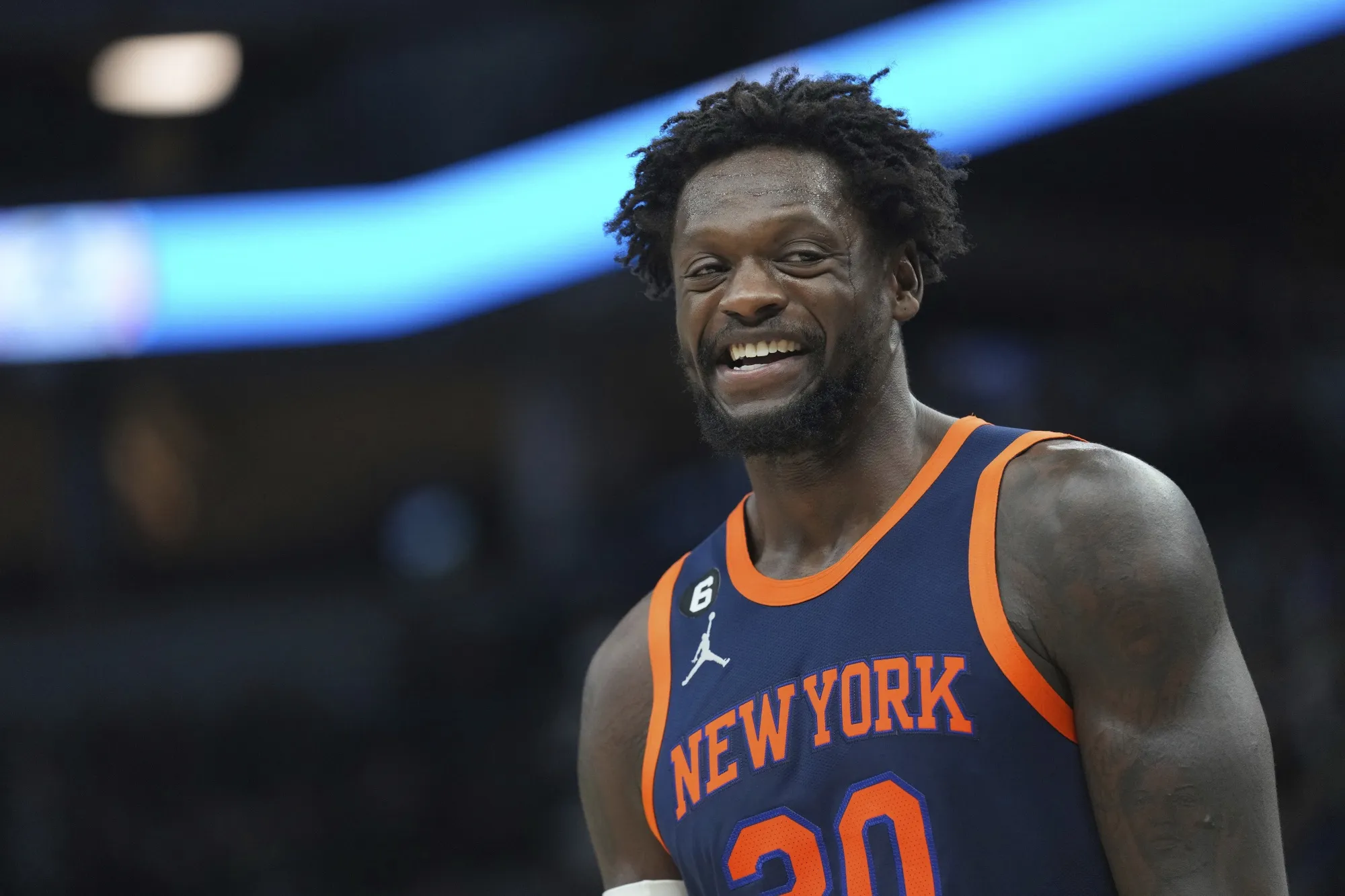 New York Knicks forward Julius Randle smiles during the first half of an NBA basketball game against the Minnesota Timberwolves, Monday, Nov. 7, 2022, in Minneapolis. (AP Photo/Abbie Parr)