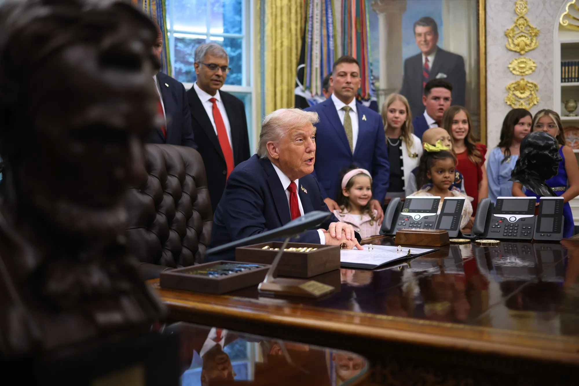US President Donald Trump speaks in the Oval Office of the White House in Washington on Sept. 30.