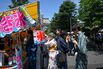 Kimono-clad tourists buy shaved ice at a stall in the Asakusa district of Tokyo