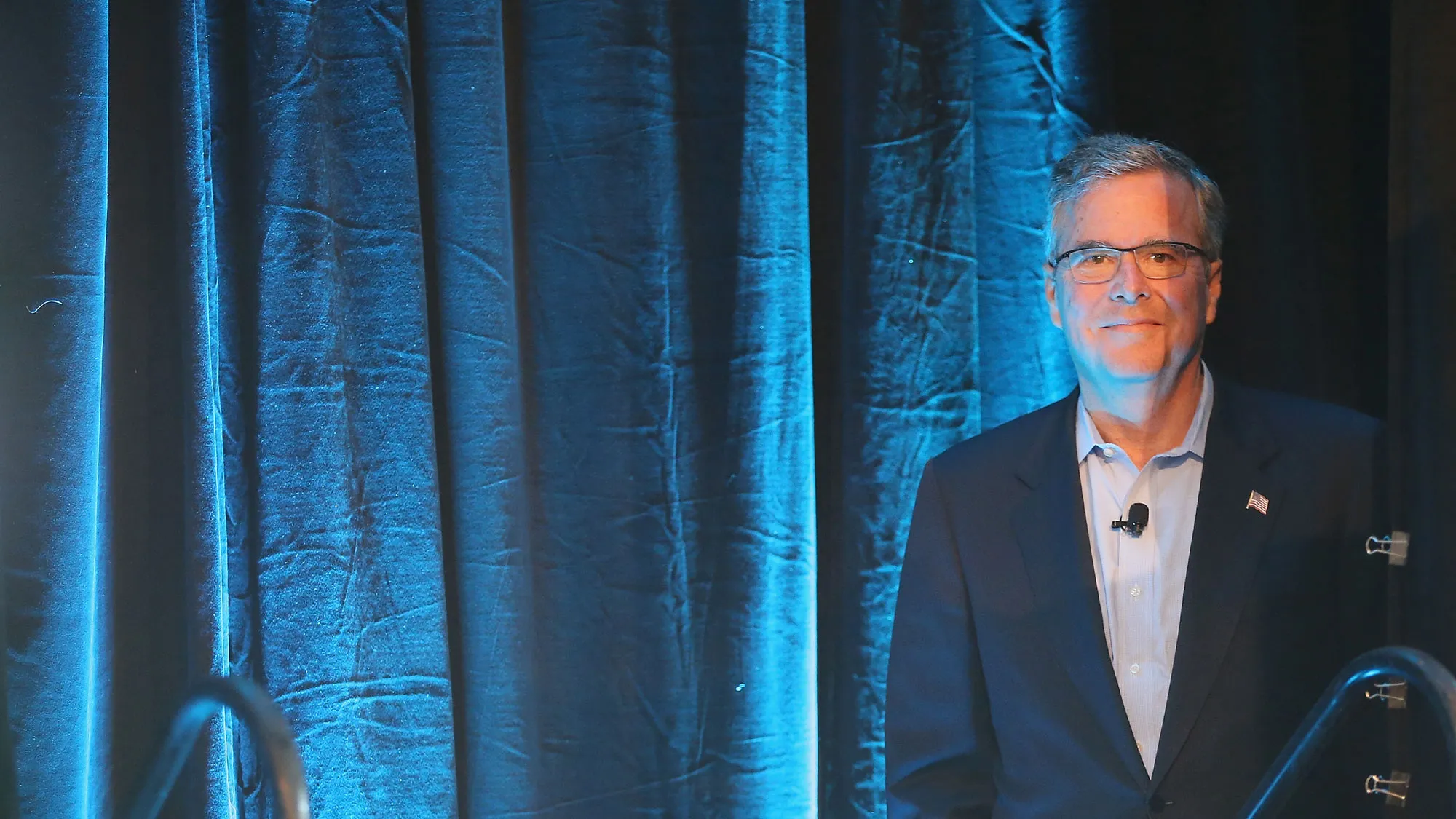 Former Florida Governor Jeb Bush waits to be introduced at the Iowa Ag Summit on March 7, 2015 in Des Moines, Iowa.
