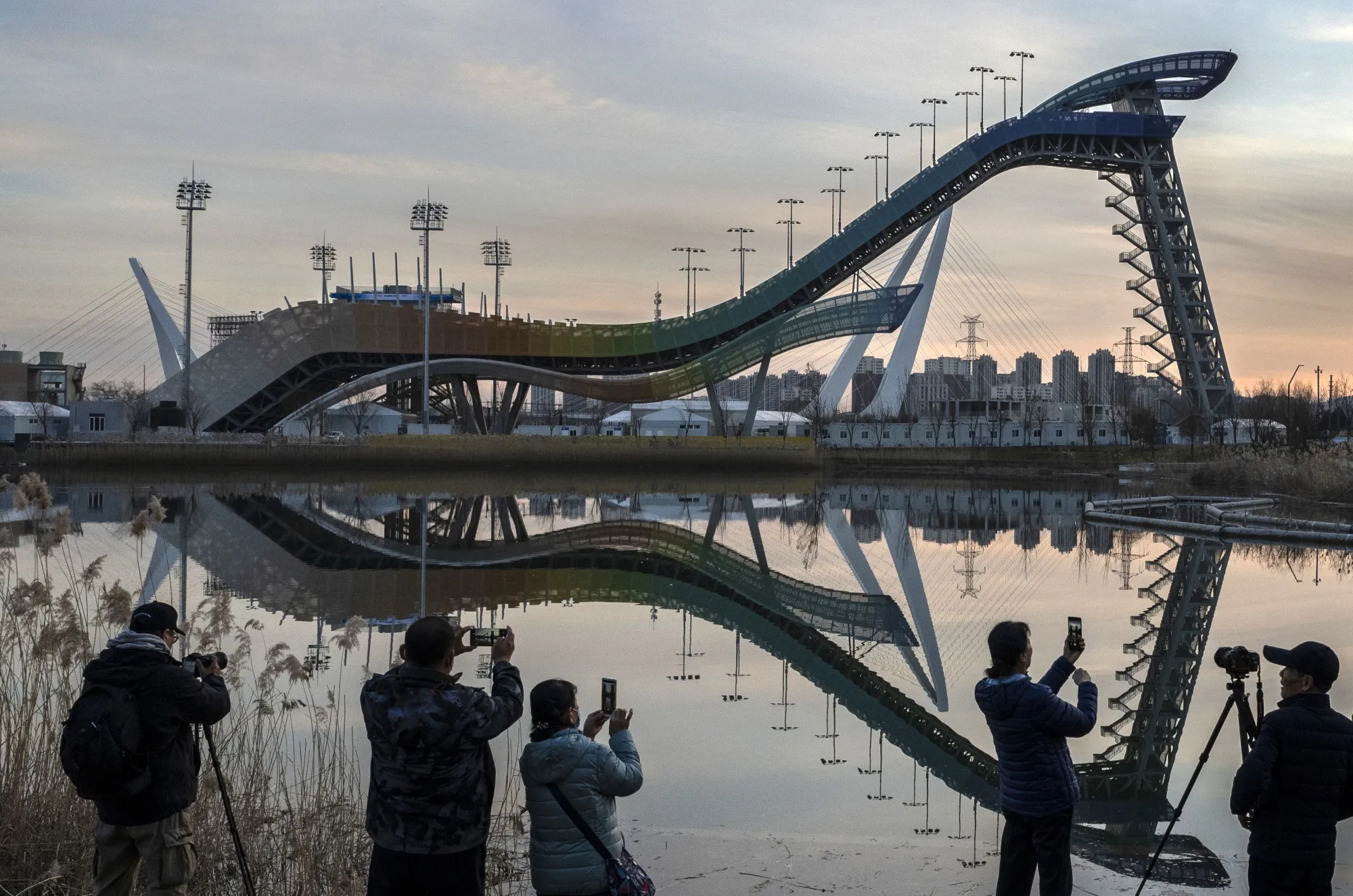 Visitors look at the Big Air venue for the Beijing 2022 Winter Olympics&nbsp;in Beijing, China.&nbsp;