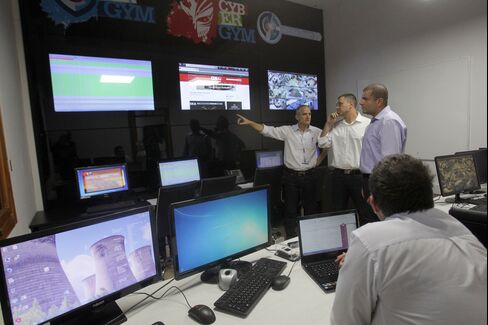 CyberGym employees based in the control centre respond to a