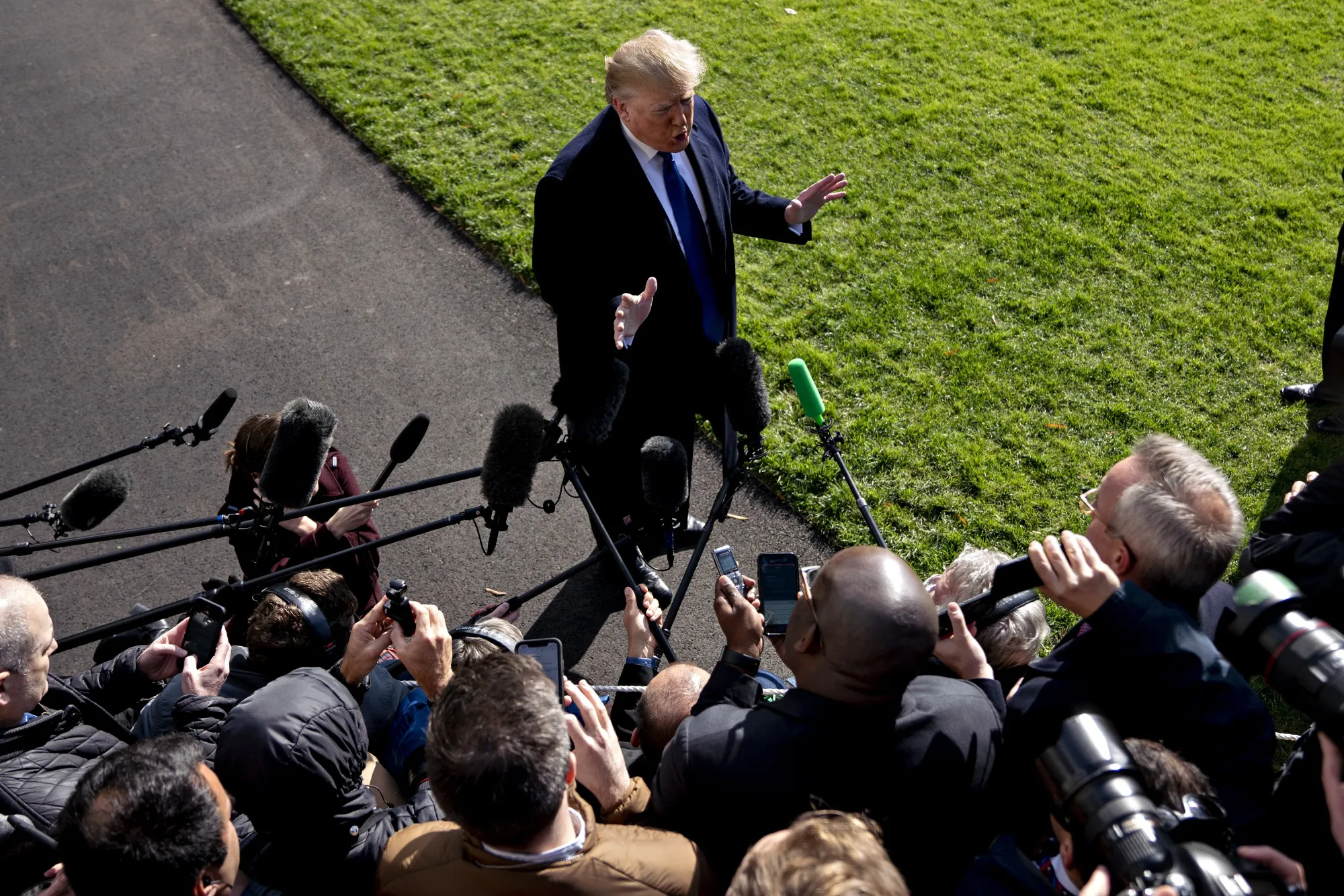 Donald Trump speaks to members of the media before boarding Marine One on the South Lawn of the White House on Nov. 8, 2019.&nbsp;