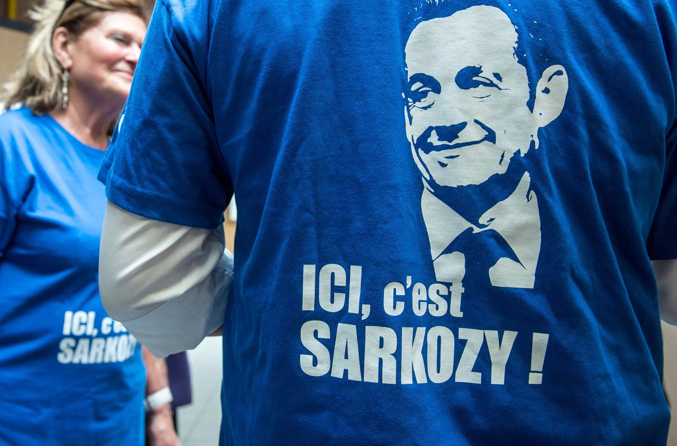 Supporters of Nicolas Sarkozy, wear t-shirts reading 'Here it's Sarkozy !' during a meeting in Le Touquet, on Aug. 27, 2016.
