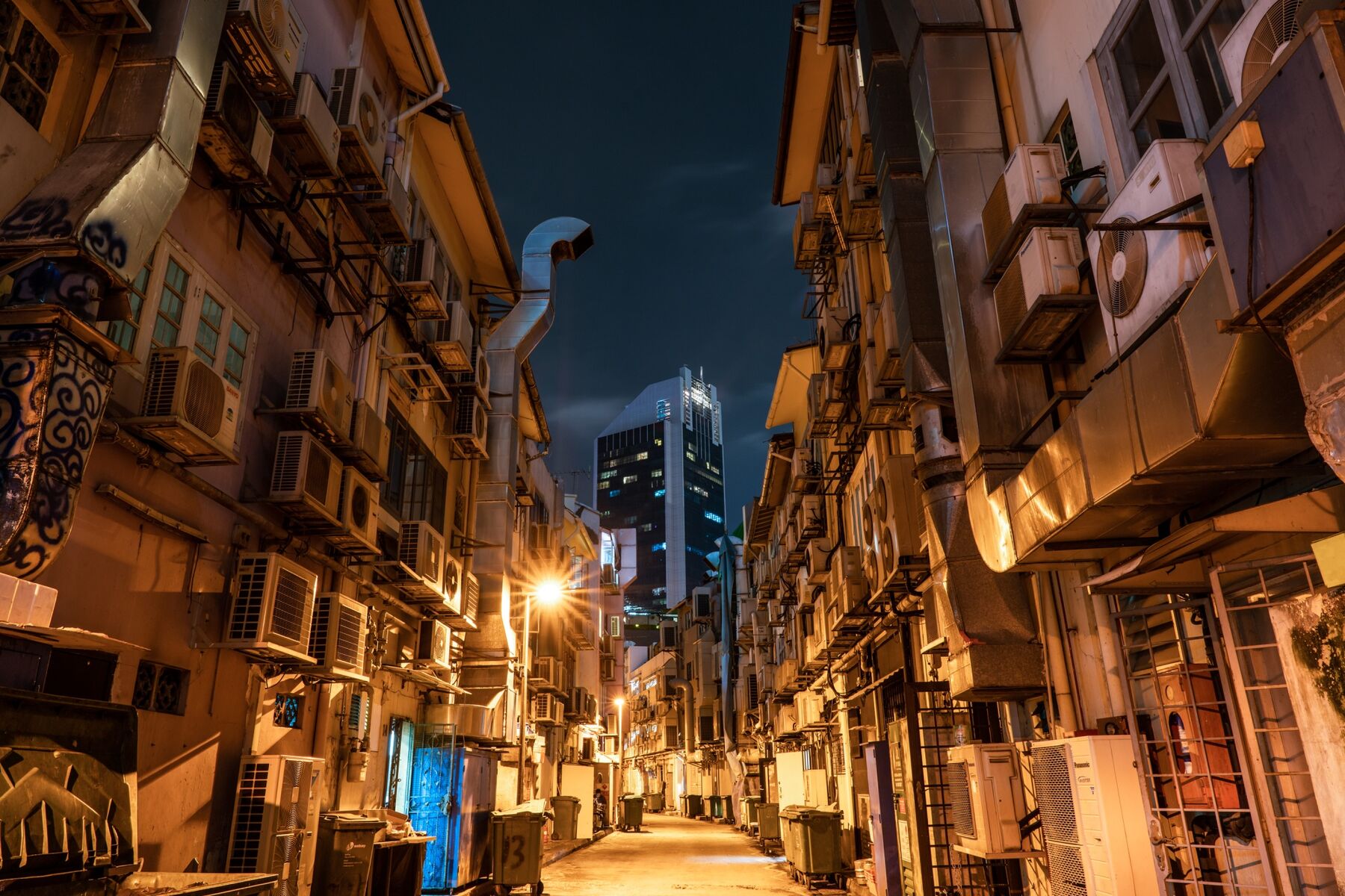 Narrow lane with air conditioning units