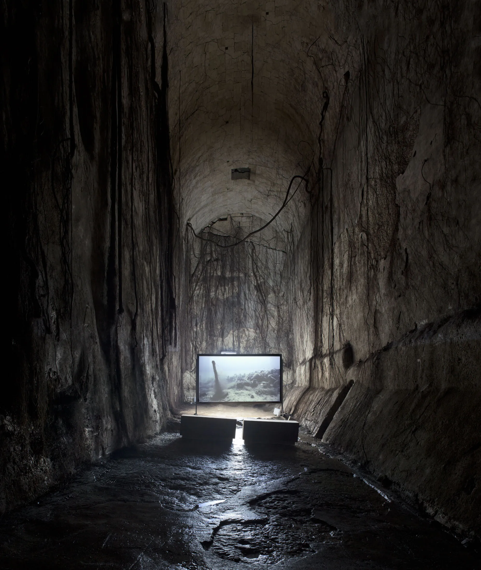 The artwork Inside the Outset: Evoking a Space of Passage by the artist Rosa Barba, set underground in a former medieval cistern.