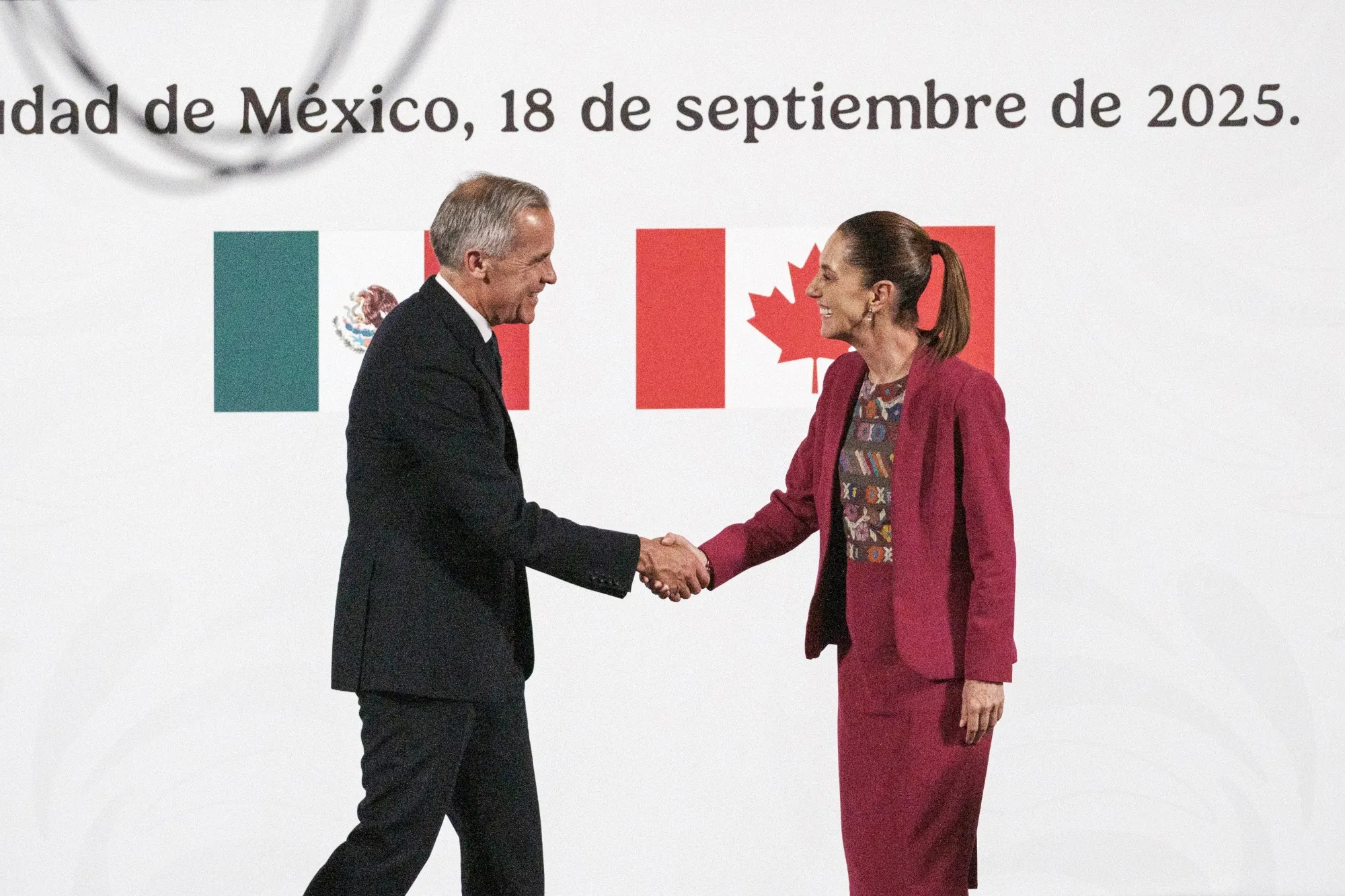 Mark Carney and Claudia Sheinbaum at a news conference in Mexico City on Sept. 18.