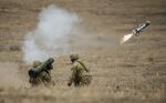 Soldiers fire a Javelin anti-tank missile.
