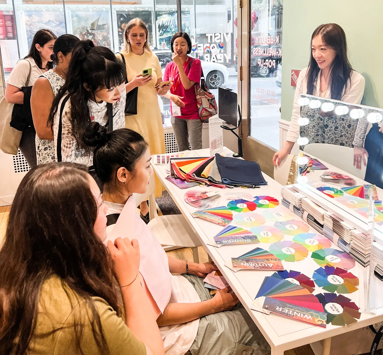 New Yorkers check out a personal color analysis pop-up at Rockefeller Center.&nbsp;&nbsp;&nbsp;