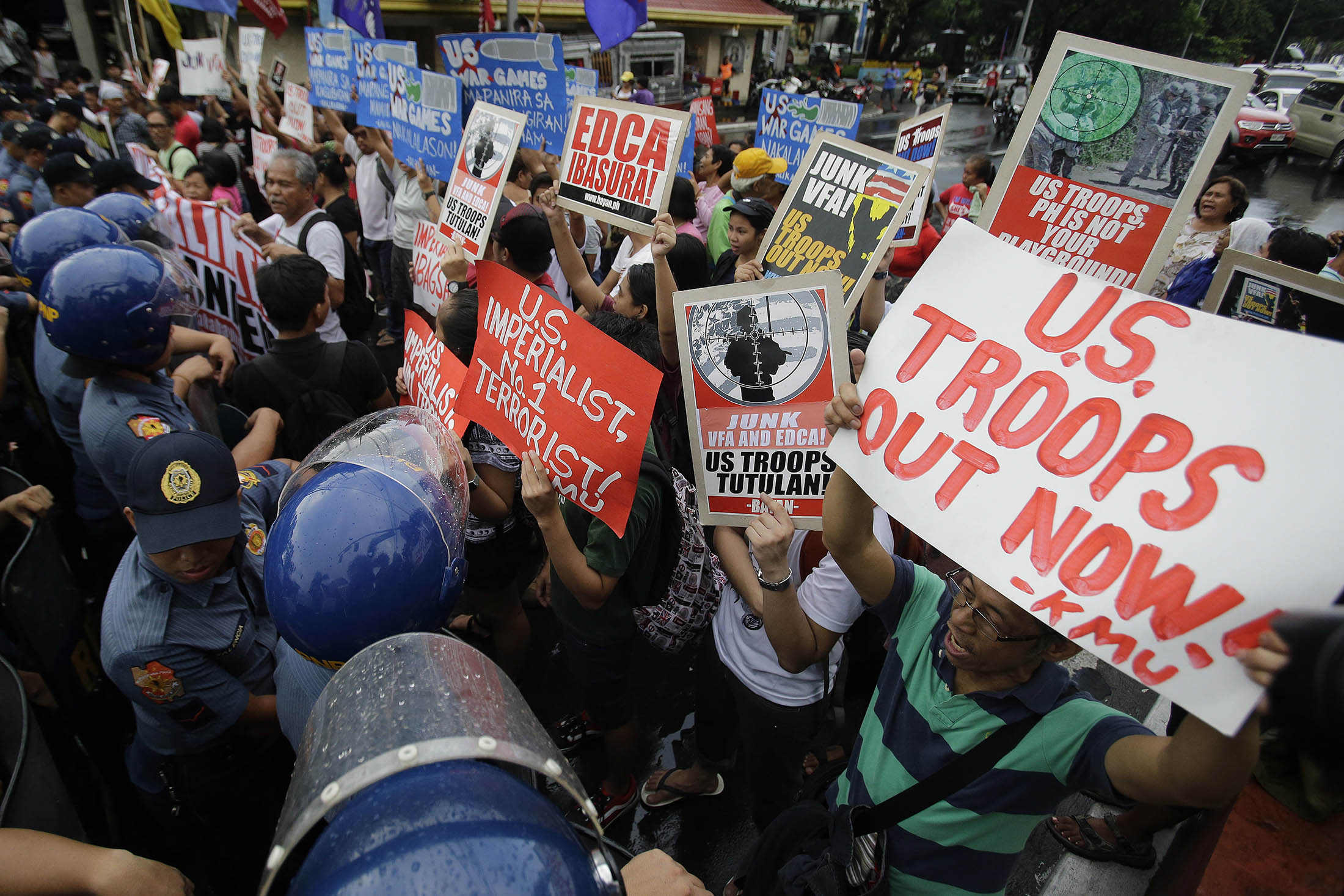 Philippine police van rams protesters in front of US Embassy