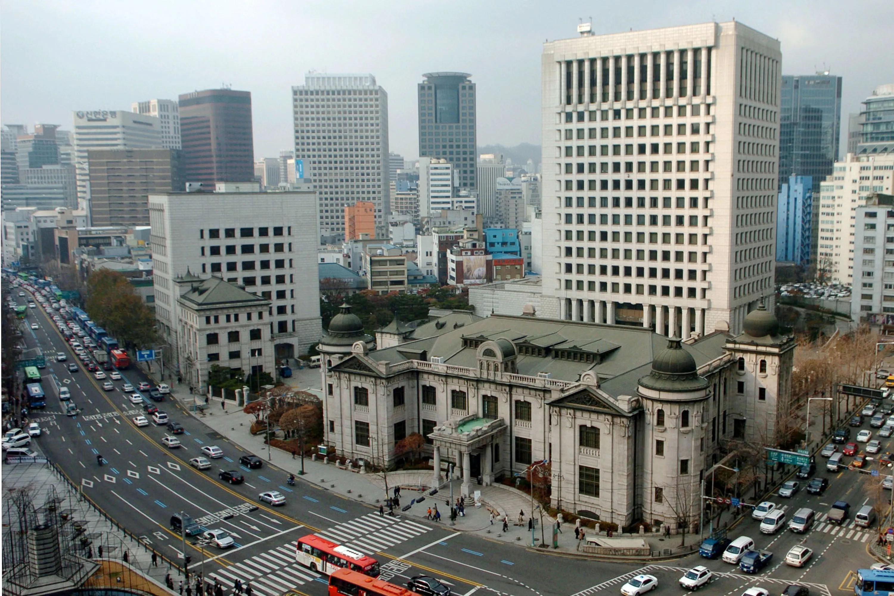 Traffic passes the Bank of Korea headquarters in Seoul, South Korea.