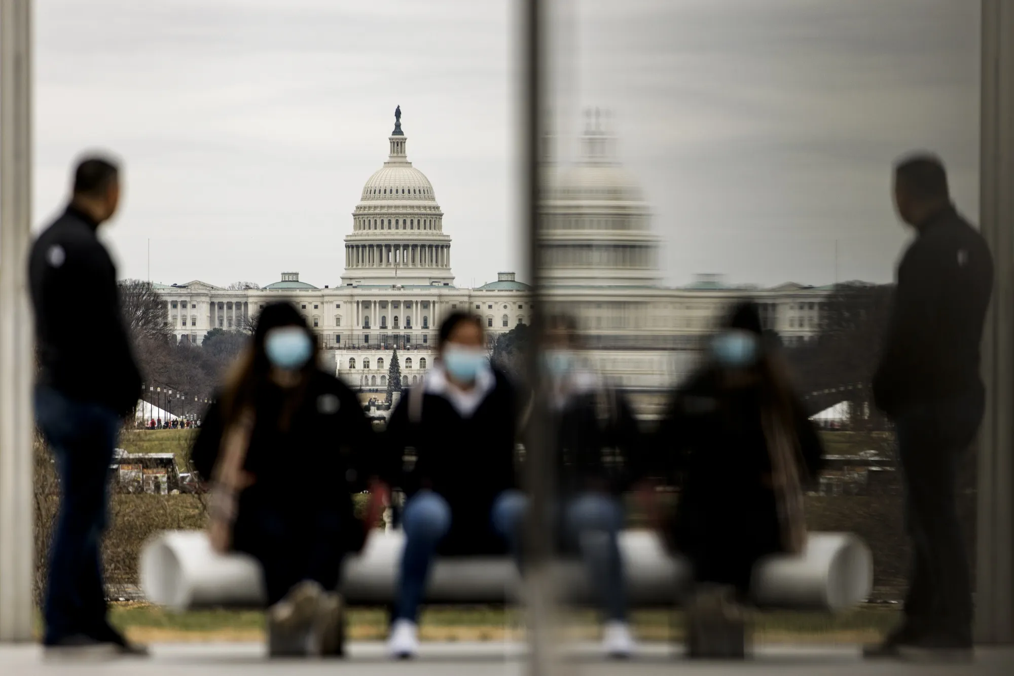 Visitors gather at the base of the Washington Monument in Washington, D.C., US.