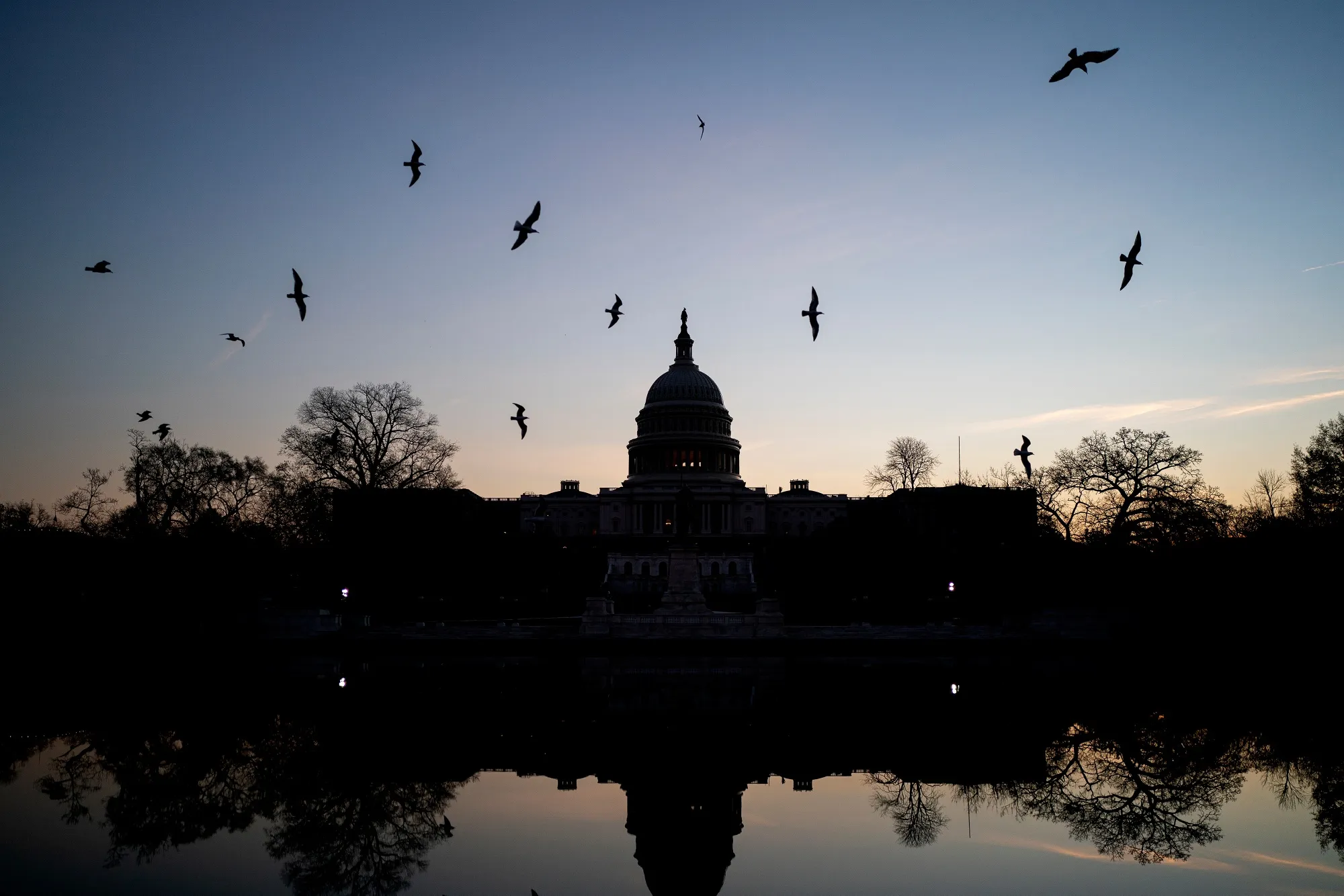 The Treasury Department is writing rules for how it will distribute the measure’s tax credits, but work on that guidance could grind to a halt if the government closes.