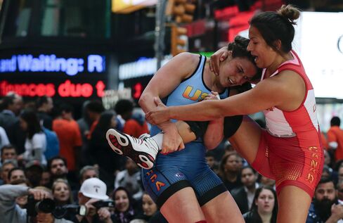 Adeline Gray, left, wrestles Justina Di Stasio