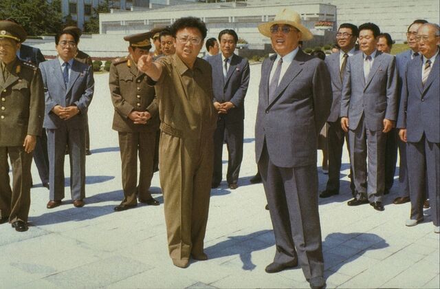 Kim Jong Il with his father, Kim Il Sung, in an undated photograph.