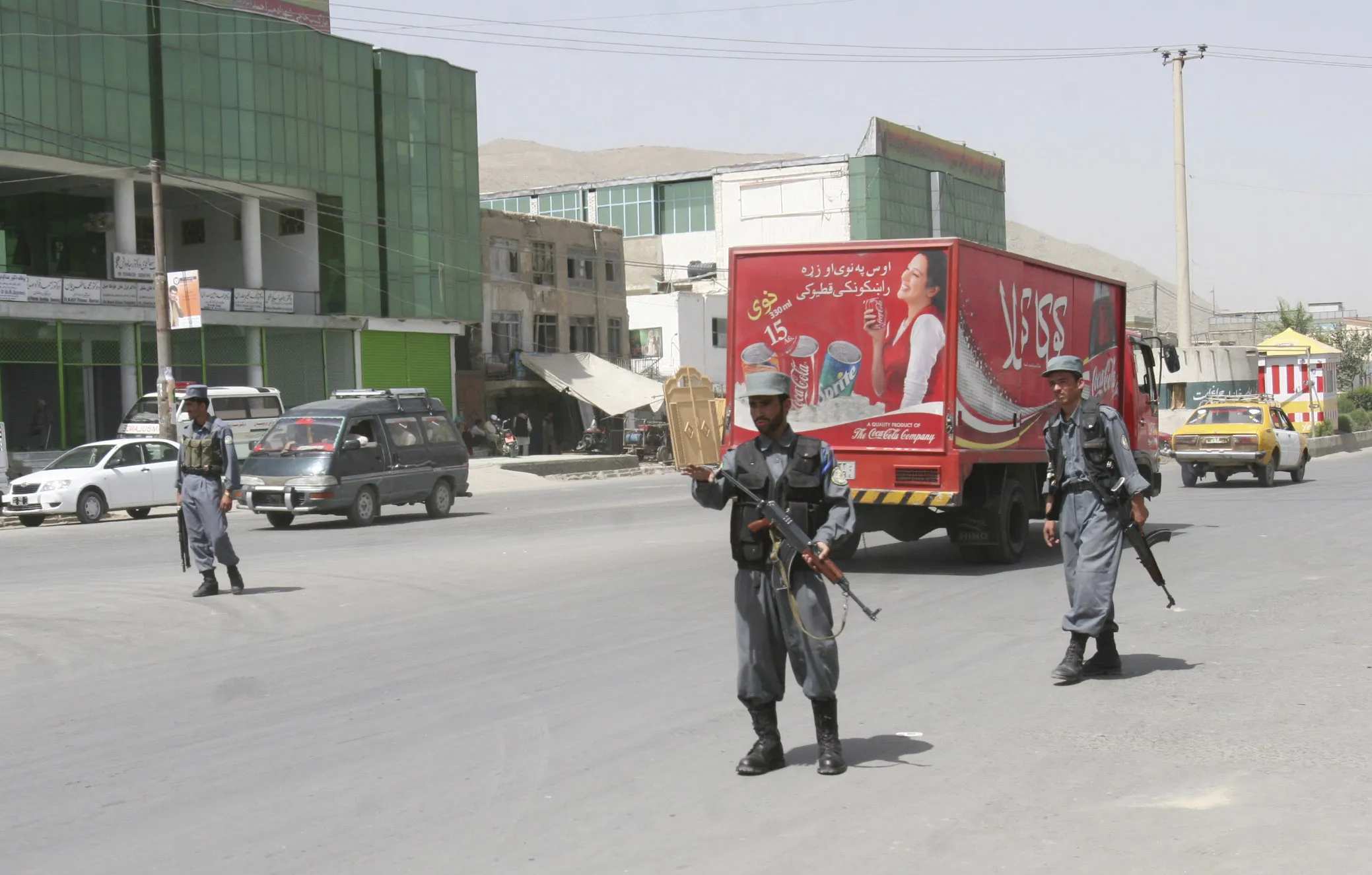 Afghan policemen a day after an attack near the Indian Embassy in Kabul, in 2008.