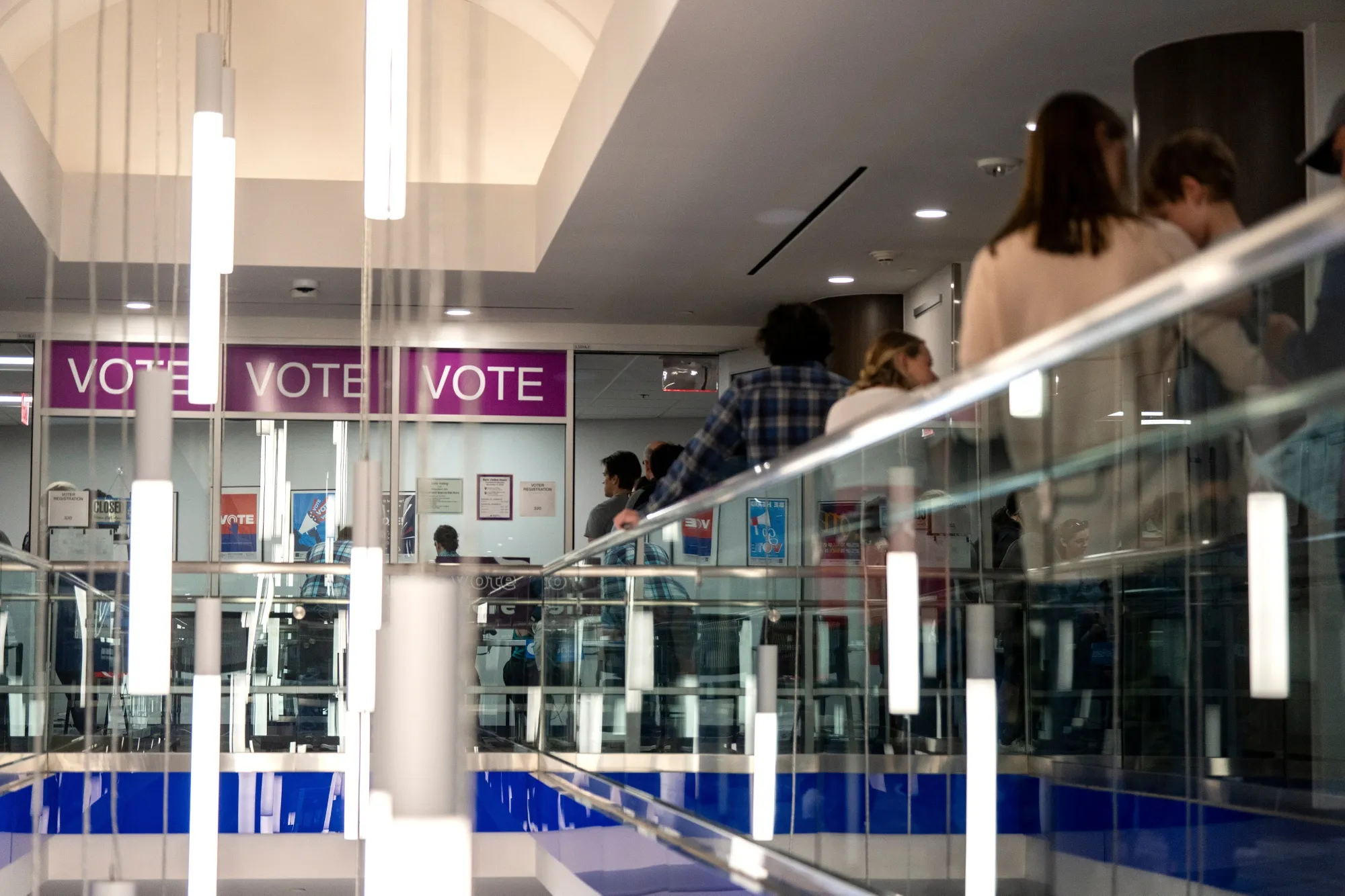 Voters wait in line to cast their ballot&nbsp;in Arlington, Virginia, on Oct. 26.