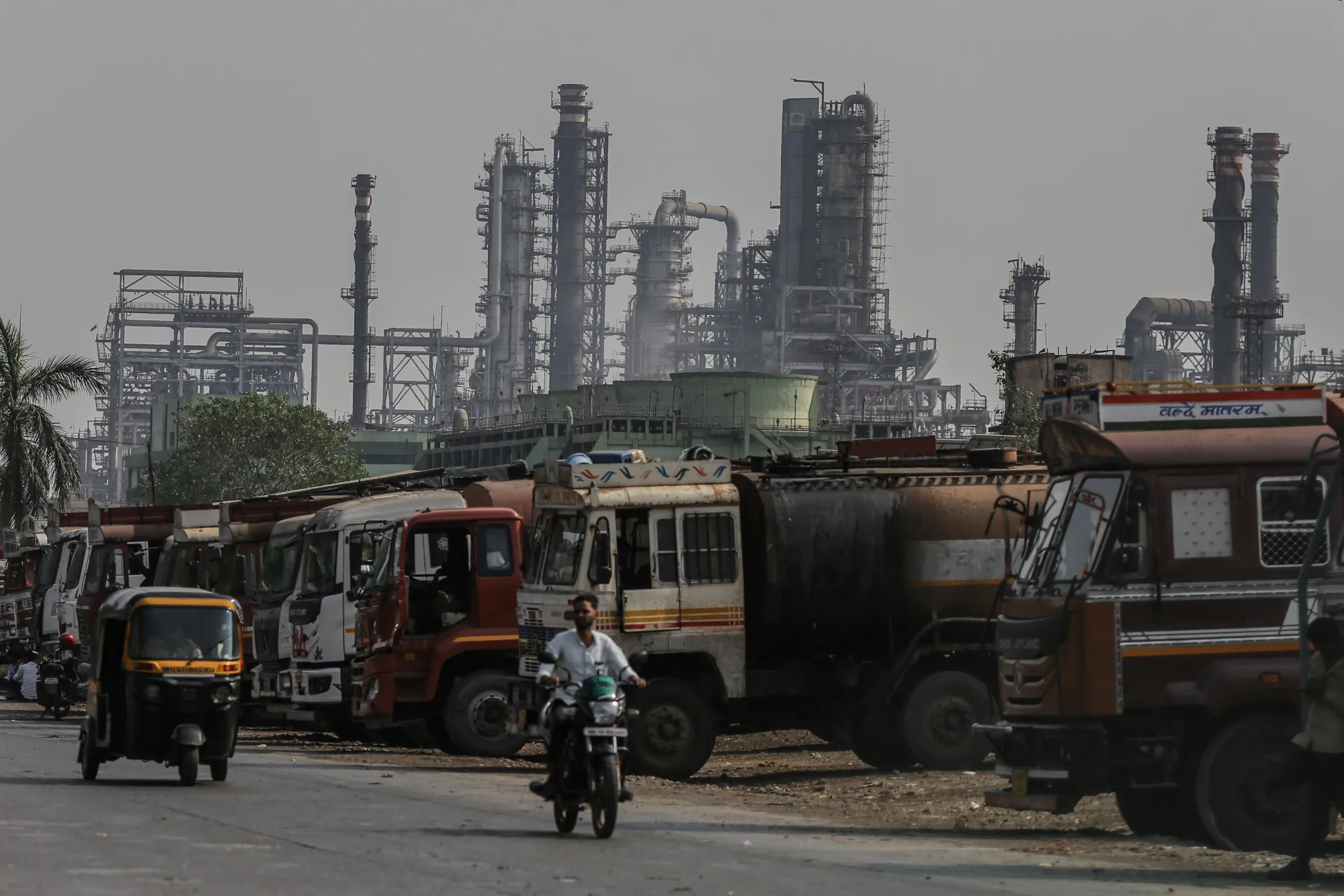 Oil tanker trucks outside an oil refinery in Mumbai, India.