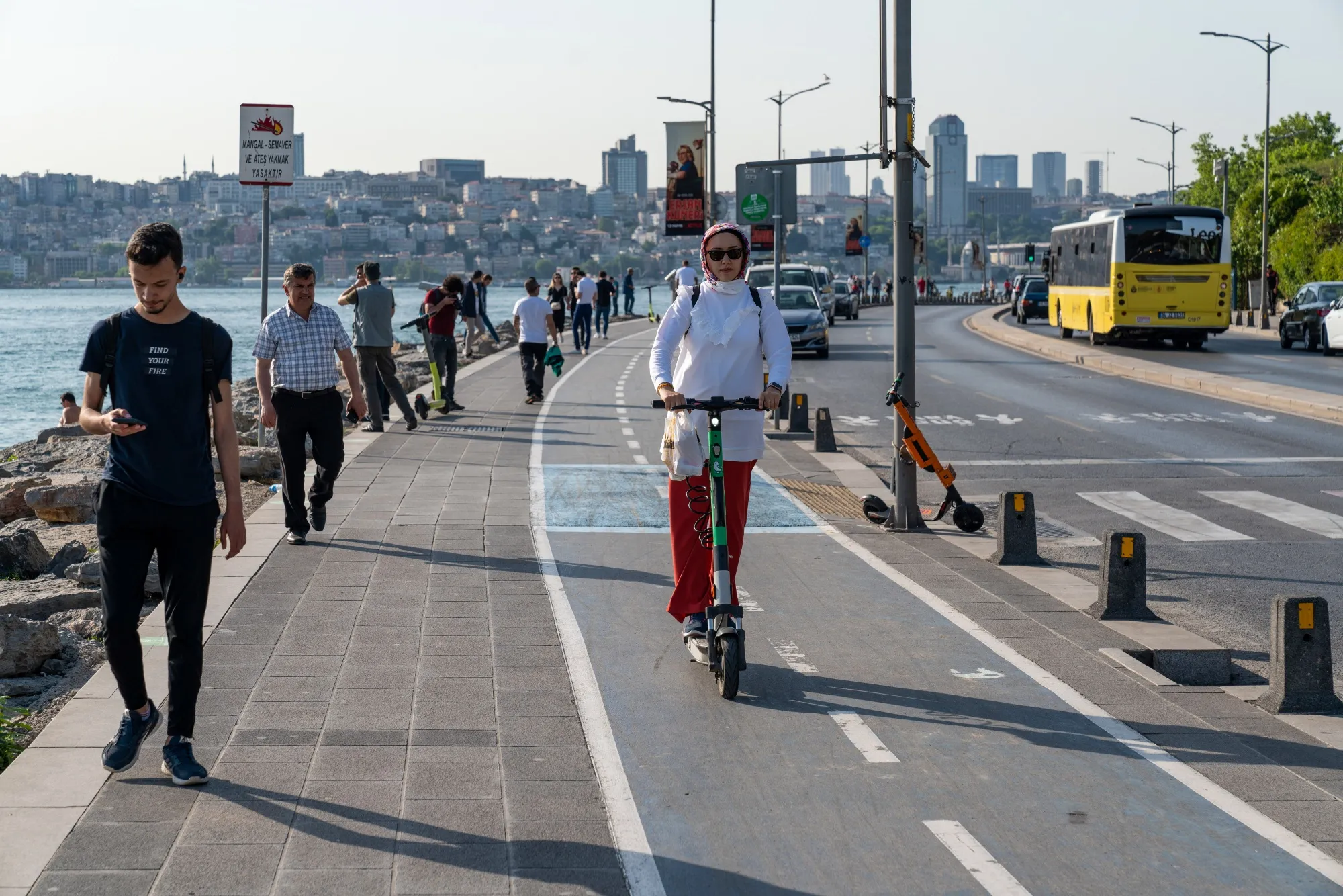 A customer rides an electric rental scooter, operated by Marti Ileri Teknoloji AS, along a cycle lane in Istanbul, Turkey.