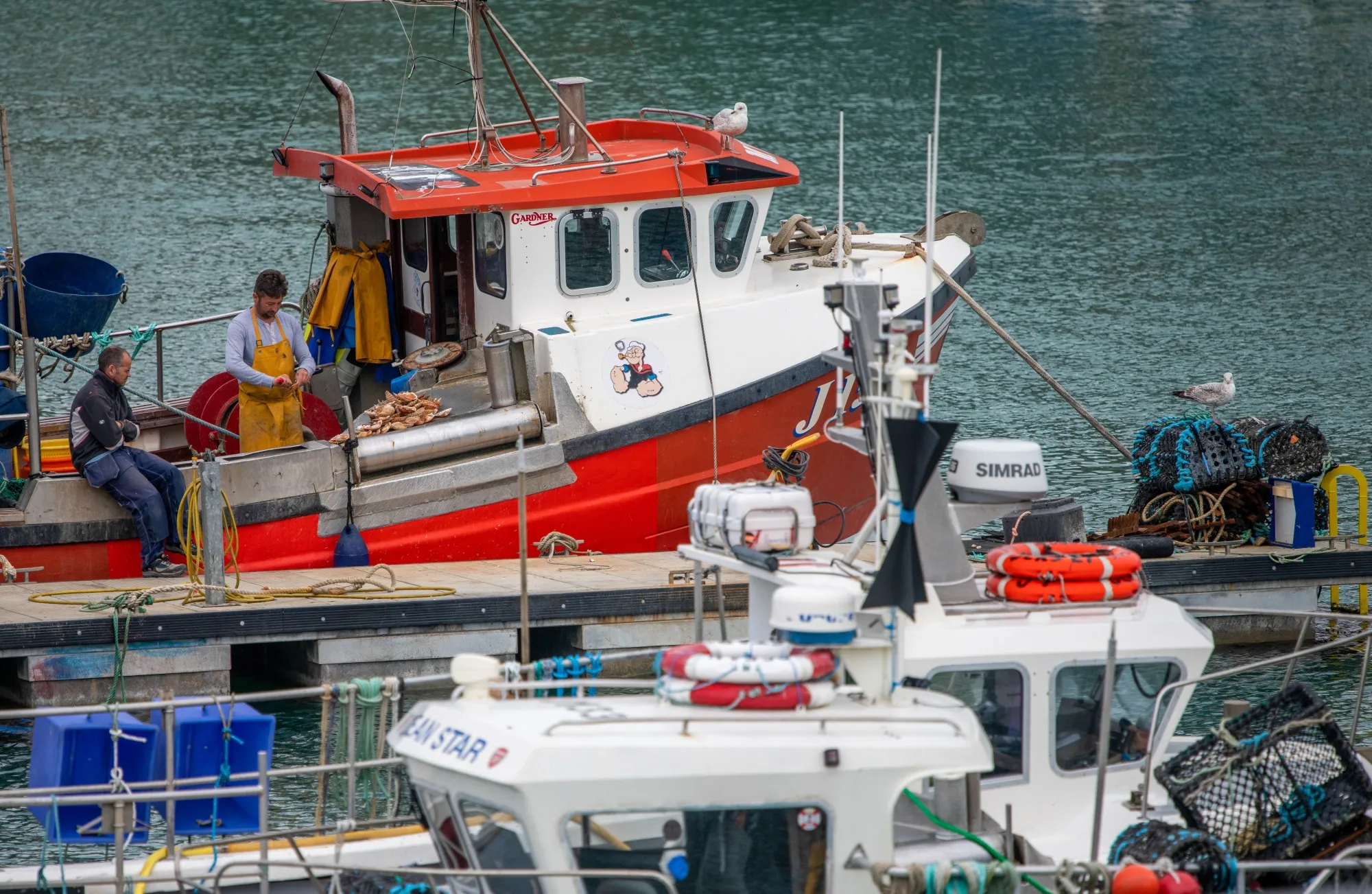Fishermen unload their catches at La Collette Marina, in St Helier, Jersey, on May 9.