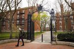 A pedestrian exits the Harvard University campus in Cambridge, Mass. on&nbsp;April 20.