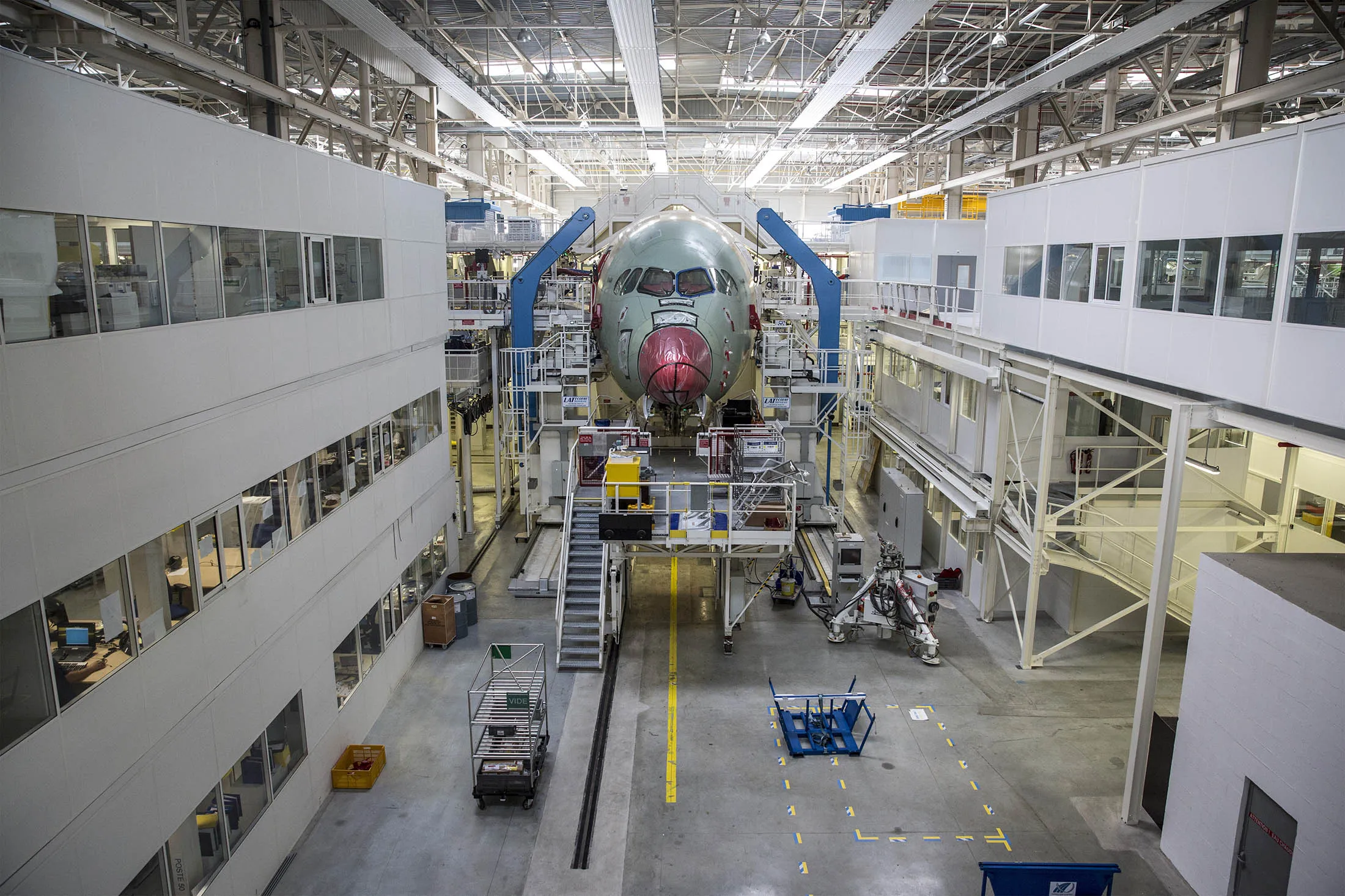 An Airbus A350 XWB passenger aircraft stands on the final assembly line at the Airbus factory in Toulouse.
