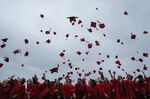 Students toss their graduation caps in the air&nbsp;at Wesleyan University in Middletown, Connecticut.&nbsp;