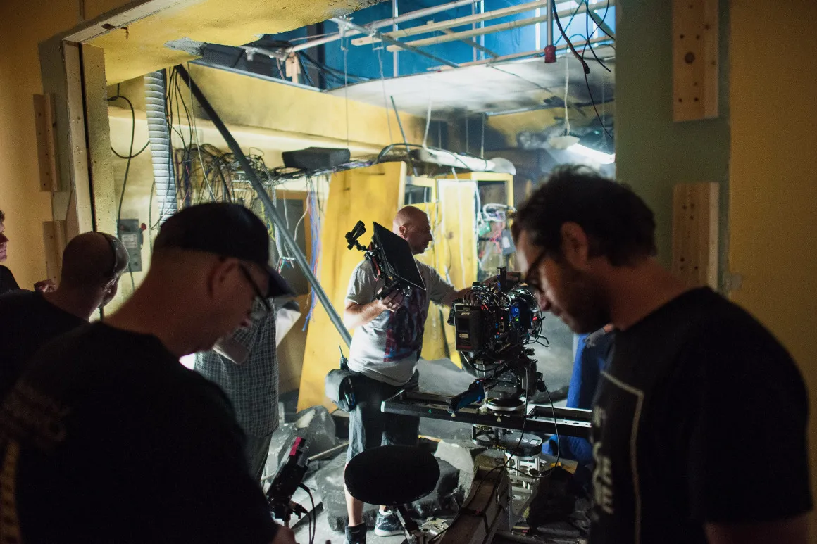 A crew breaks down a scene following filming a television show in Toronto.