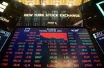 An electronic screen displays stock market information at the New York Stock Exchange.